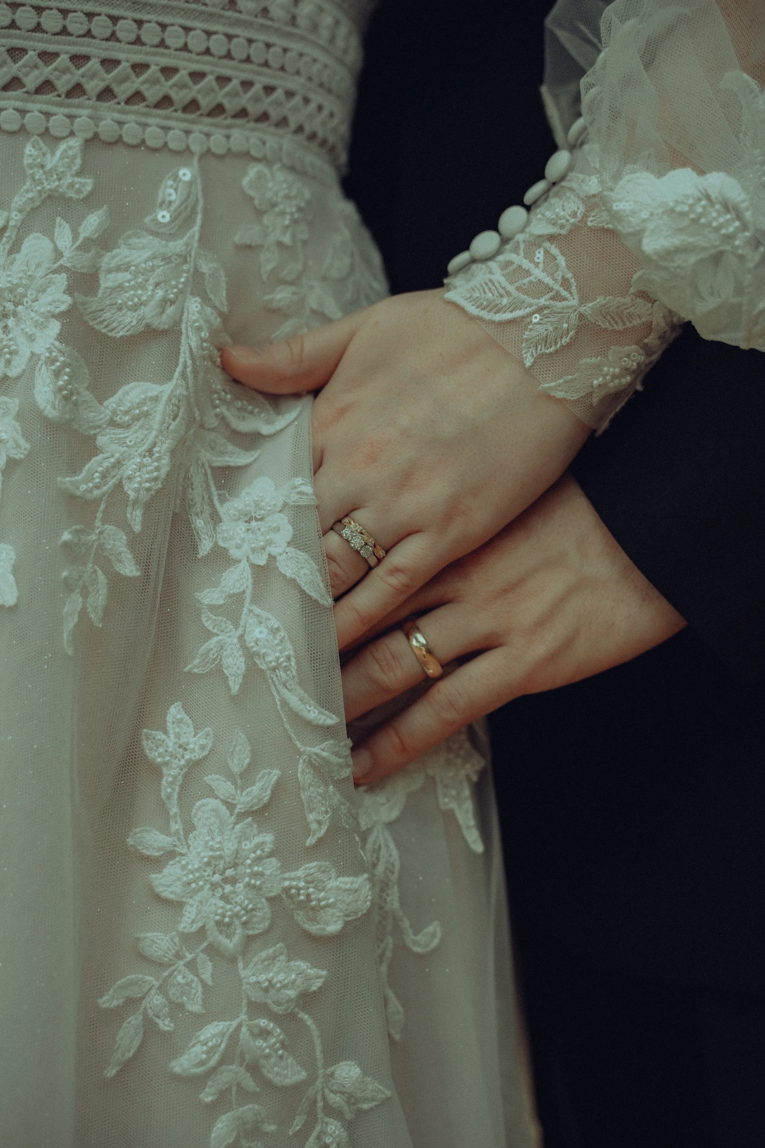Close-up of wedding rings photographed on wedding day in Buford GA