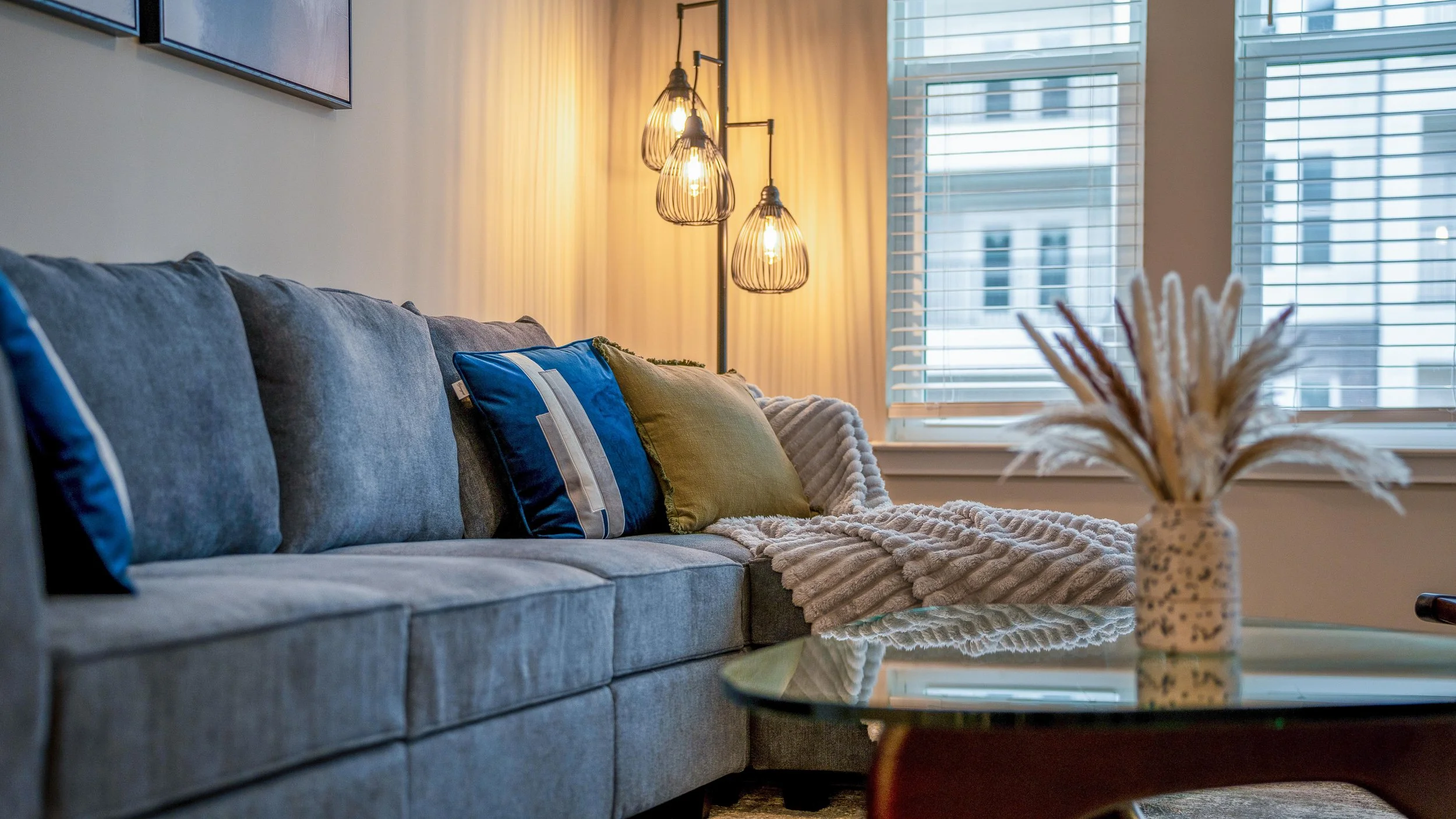 Close-up of living room furniture, lighting, and decor photographed professionally