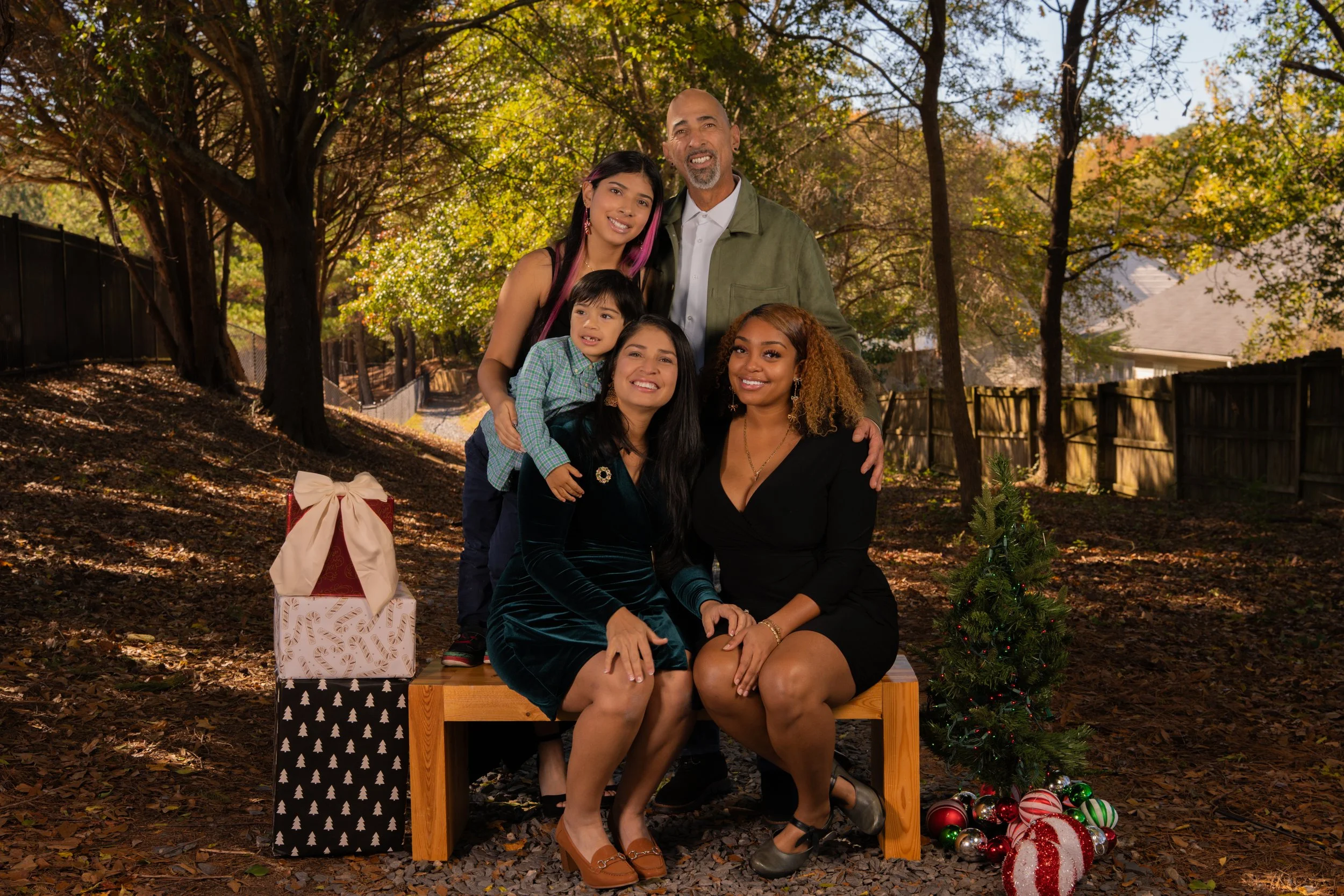 Family Posing For Holiday Photos in Buford GA