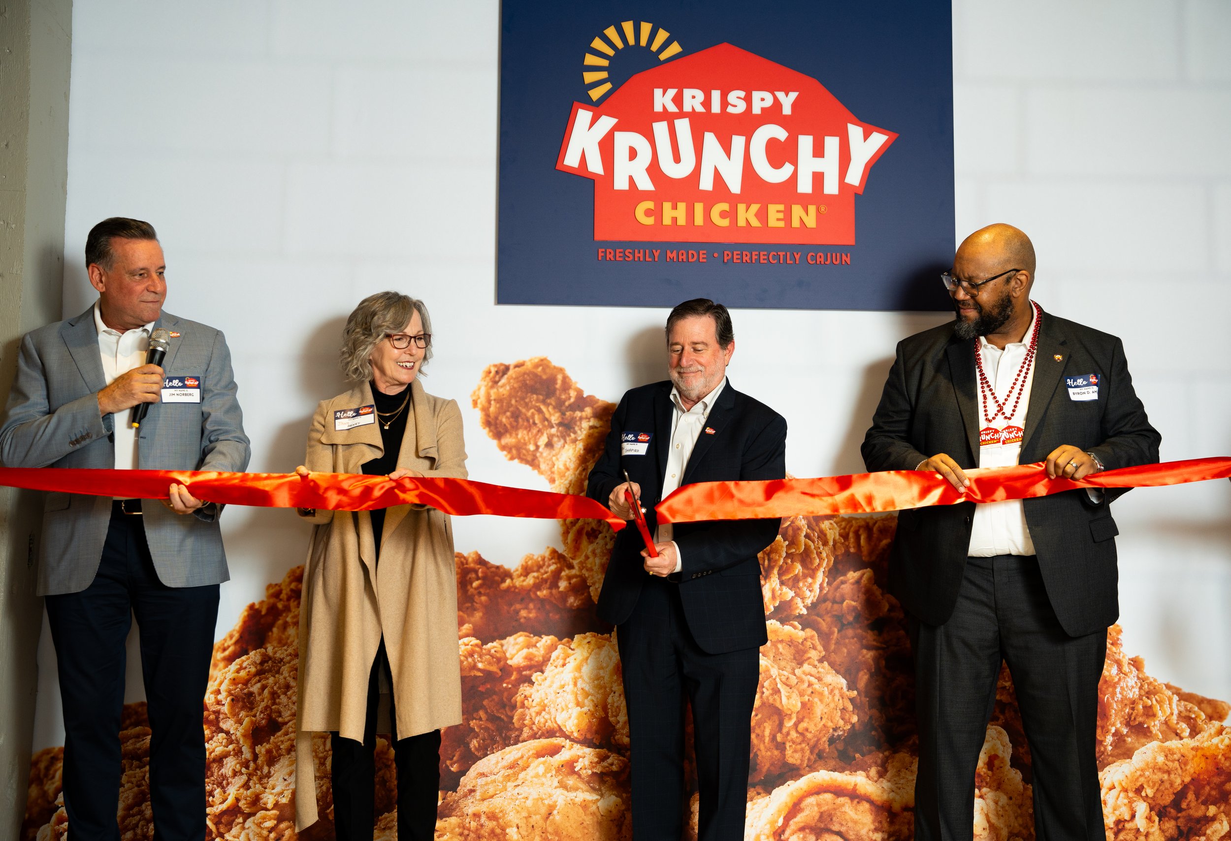 Ribbon-cutting ceremony celebrating grand opening of new business