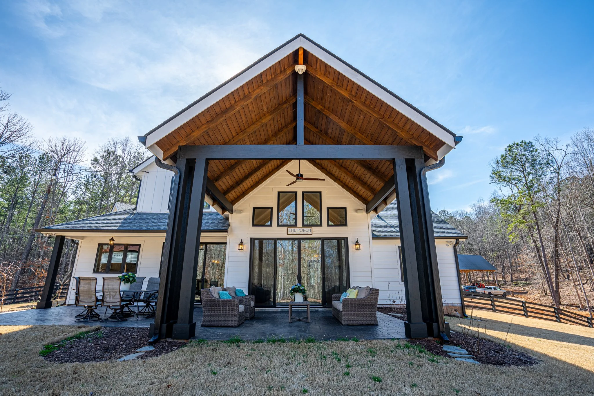 Patio and dining area in luxury backyard captured for real estate listing