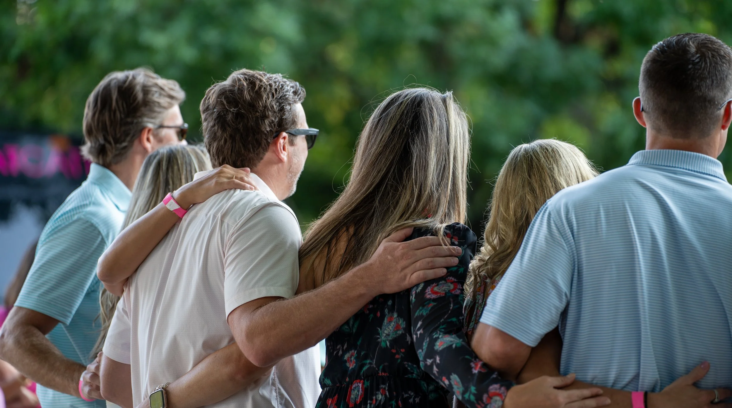 Attendees enjoying charity gala with dinner and fundraising activities