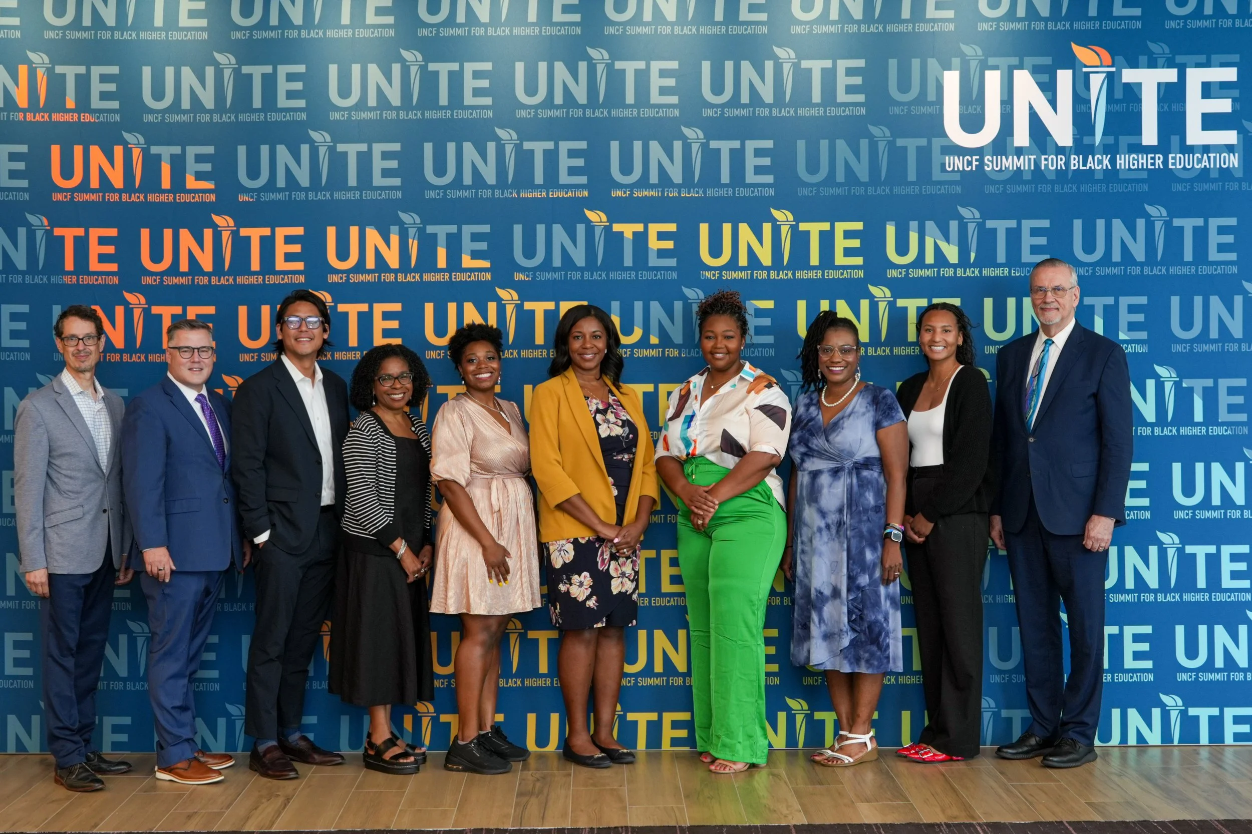 Group portrait of professionals at networking event