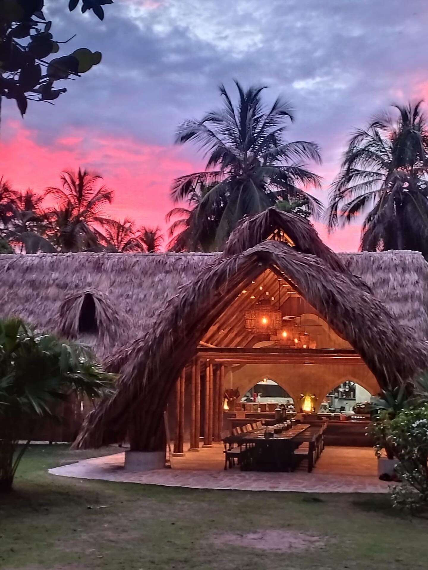 As the sun slips into the jungle, picture yourself dining beneath a pink sky, wrapped in the glow of magic hour. Our paradise awaits you 💗🛖🌿