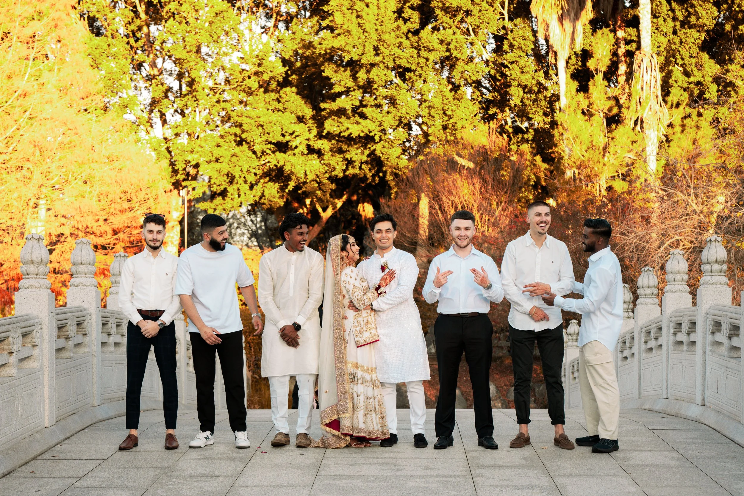 Sunset group photo at outdoor wedding - family & friends celebration, Sydney.