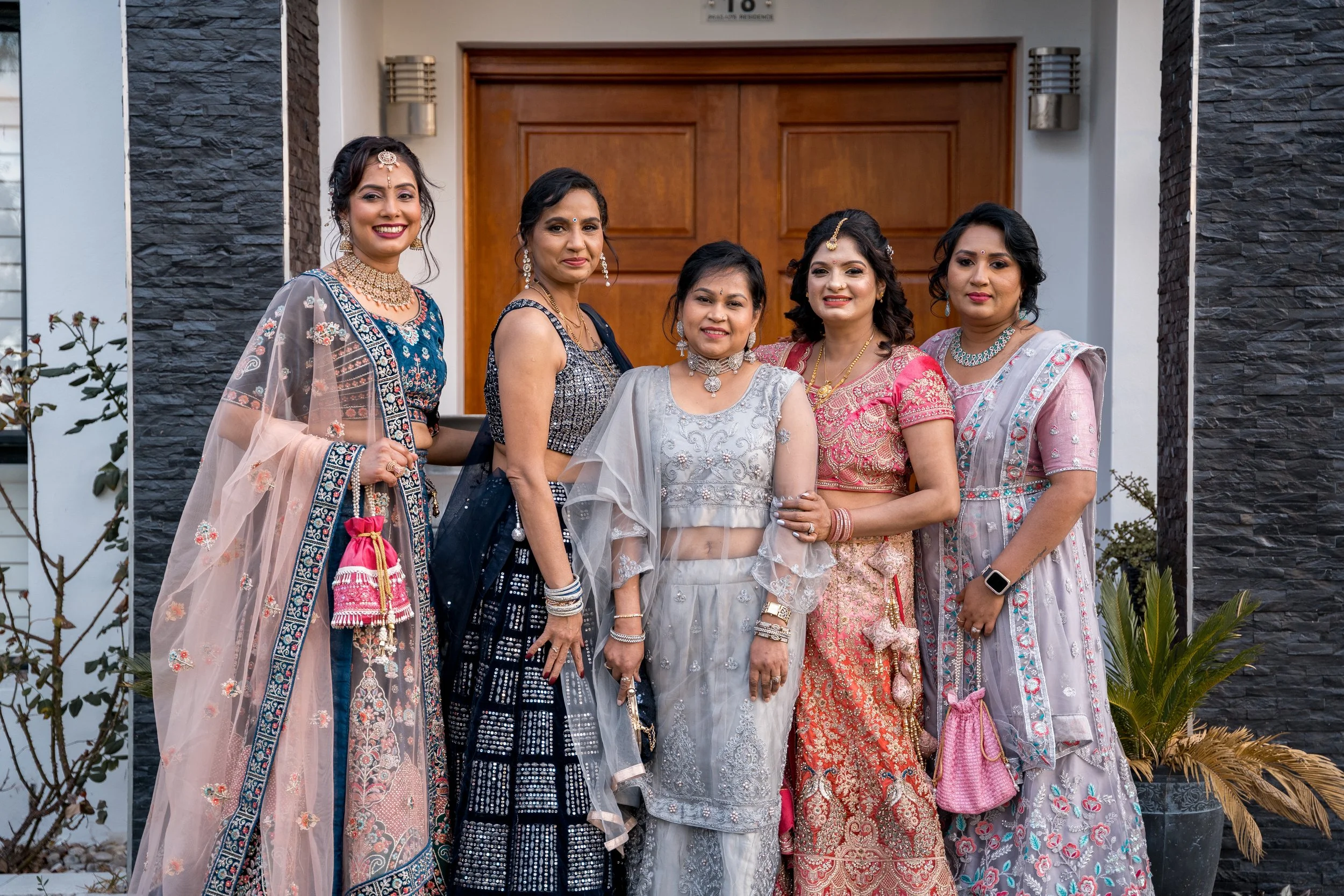 Bridesmaids in traditional outfits outside the family home - pre-wedding portraits, Sydney.