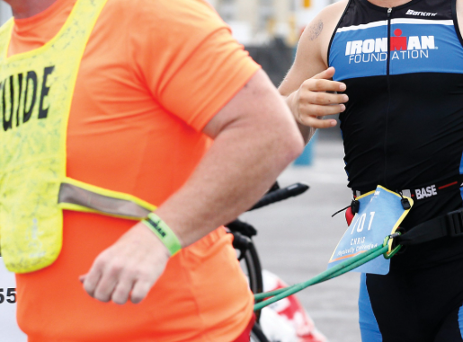 Tethered Ironman Physically Challenged Athlete