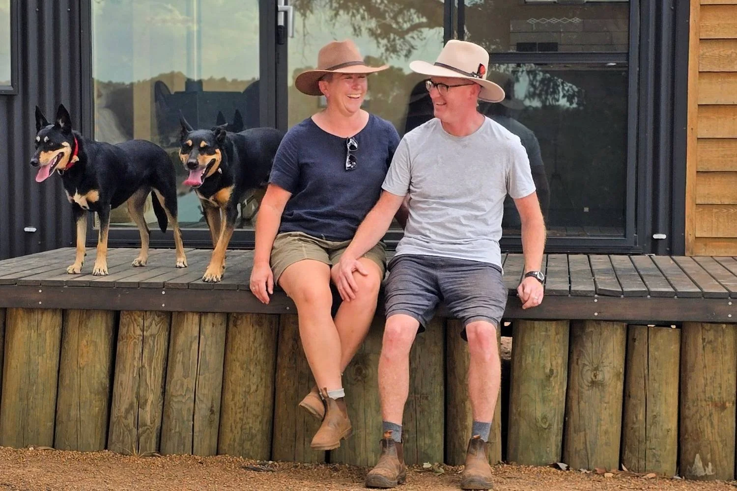 Wagtails Watch owners Em and Rod with their two dogs on their 50-acre farm in Bindoon, Chittering Valley