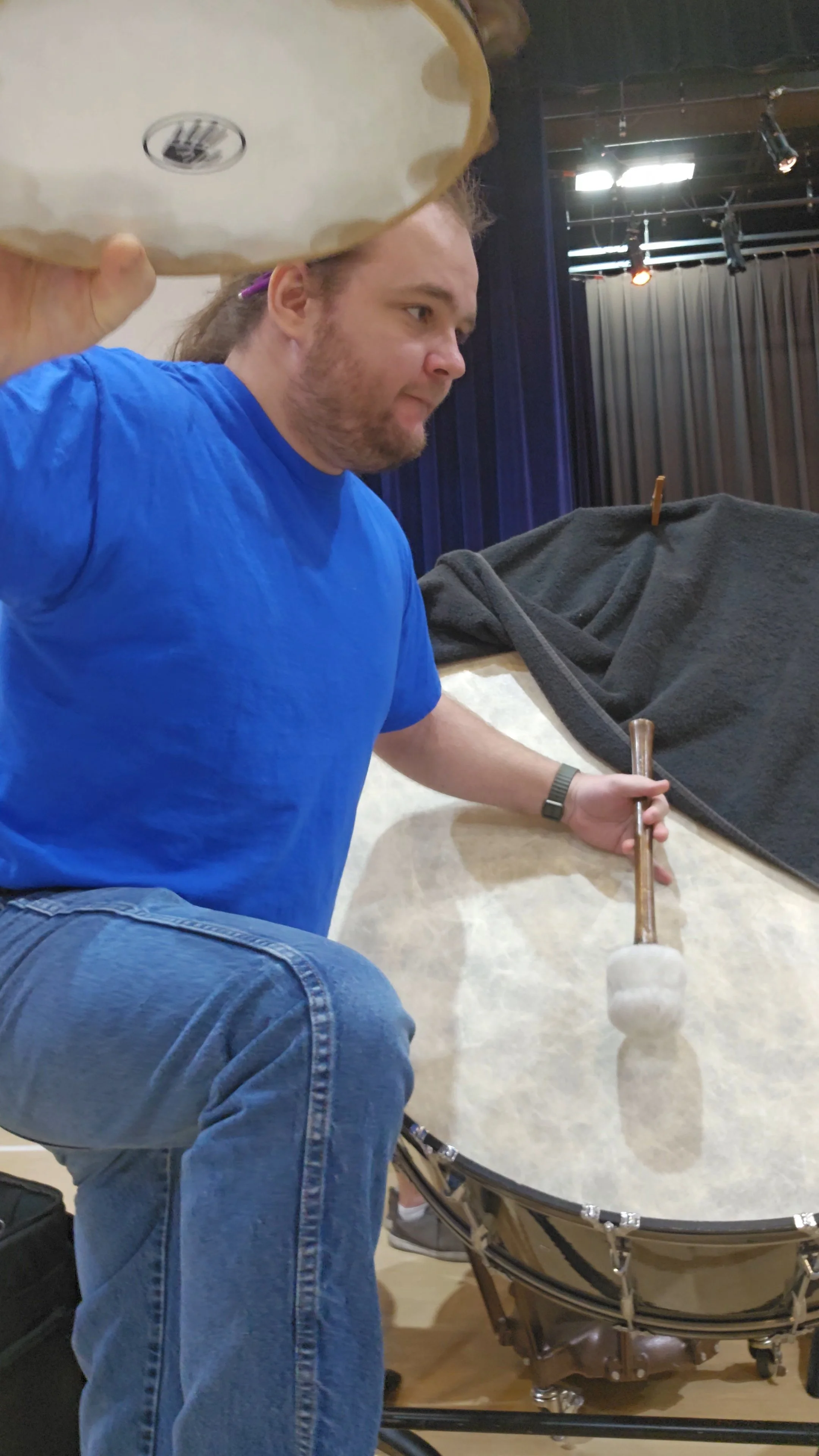 Kyle Collins (that's me!) playing the bass drum and tambourine at the same time. [image]