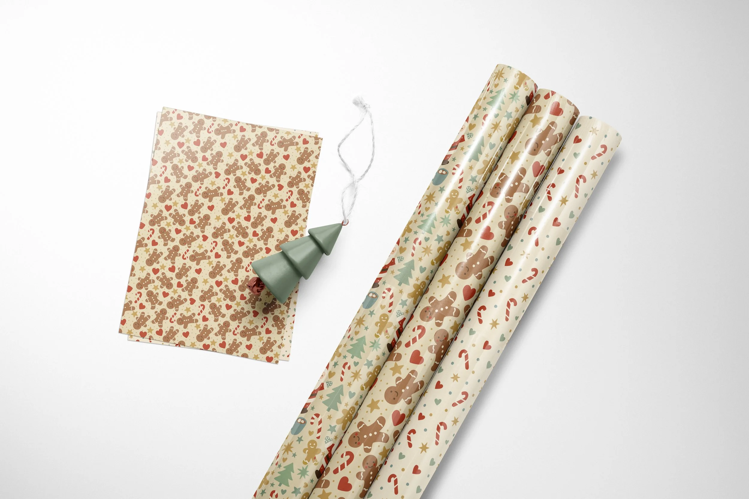 Candy cane, heart and star Christmas pattern shown on wrapping paper