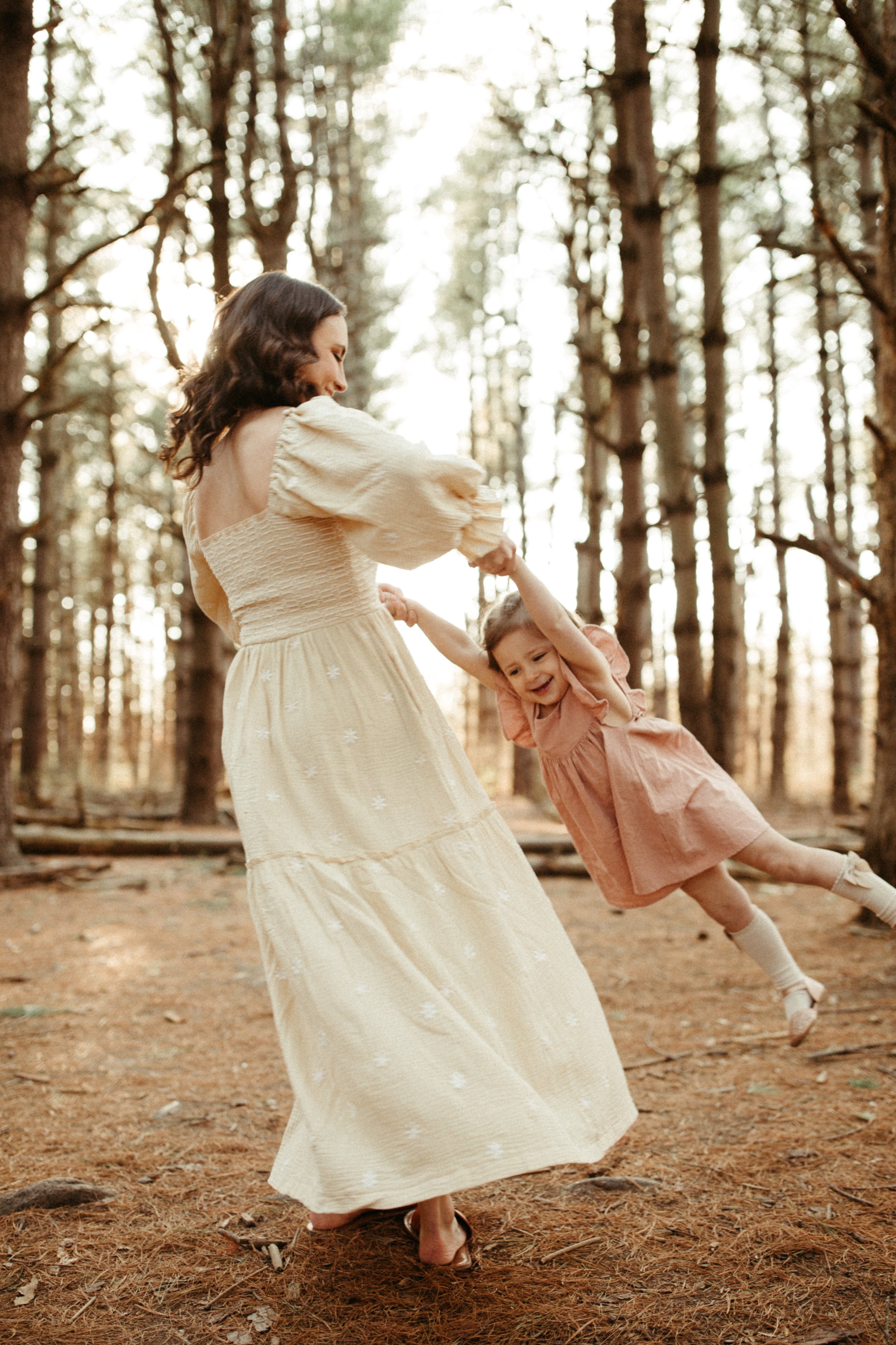 Mom Swinging Daughter.jpg