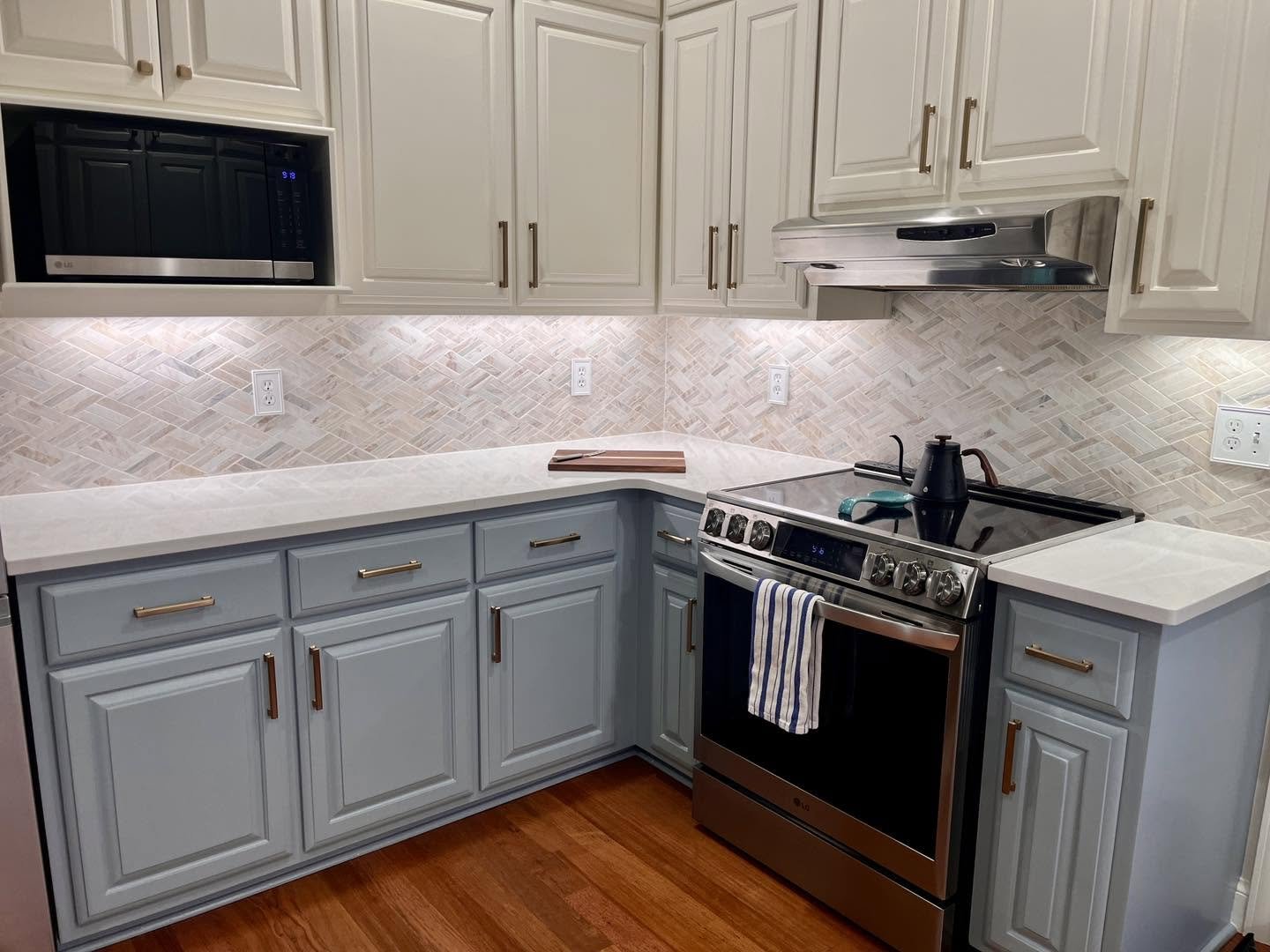 Complete kitchen remodeling with custom cabinetry, countertops, tile backsplash, and modern finishes. Residential kitchen renovation featuring new cabinets, countertops, backsplash tile, plumbing fixtures, and flooring.