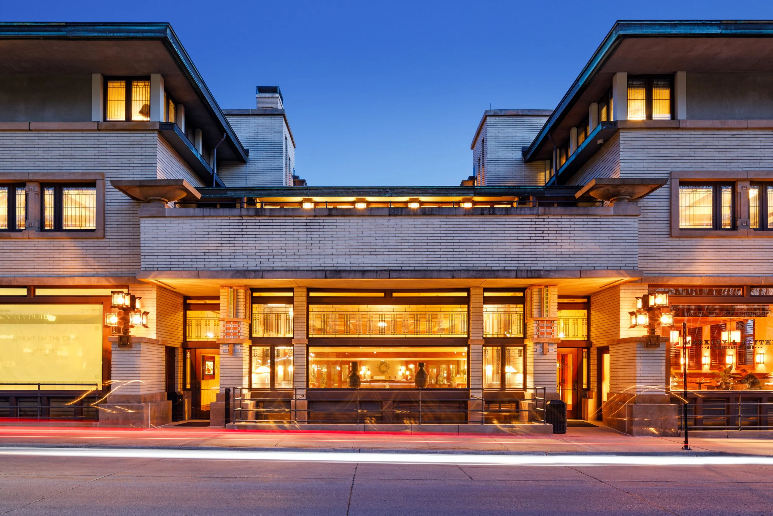 Outside of the Historic Park Inn Hotel at night.
