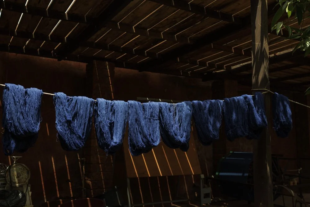 Dyed yarns hang to dry at the Xoomba studio in Bolomakoté, Bobo Dioulasso, Burkina Faso.
