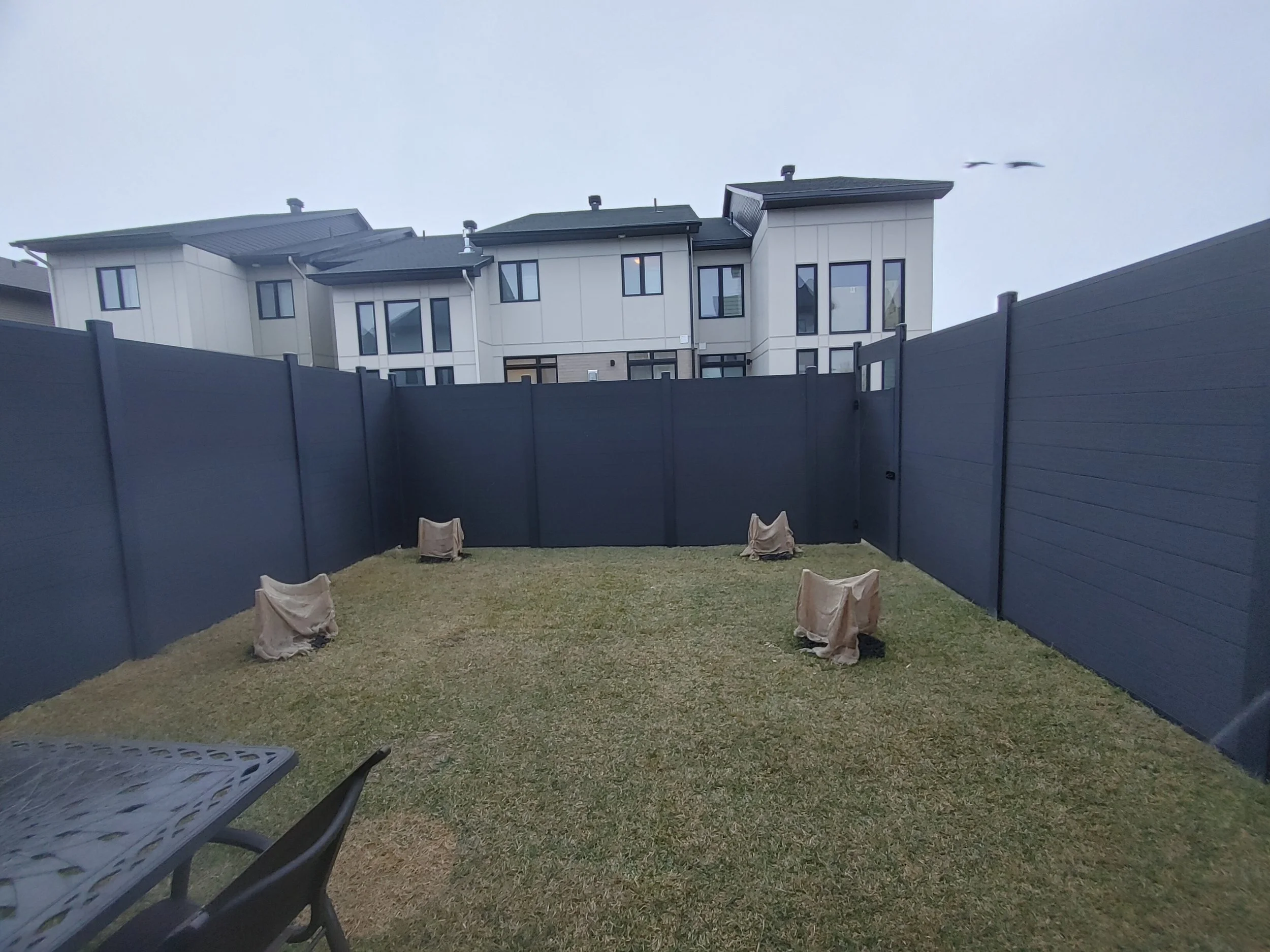 Black WPC Fence in Stittsville, 2025. StandArt Fence