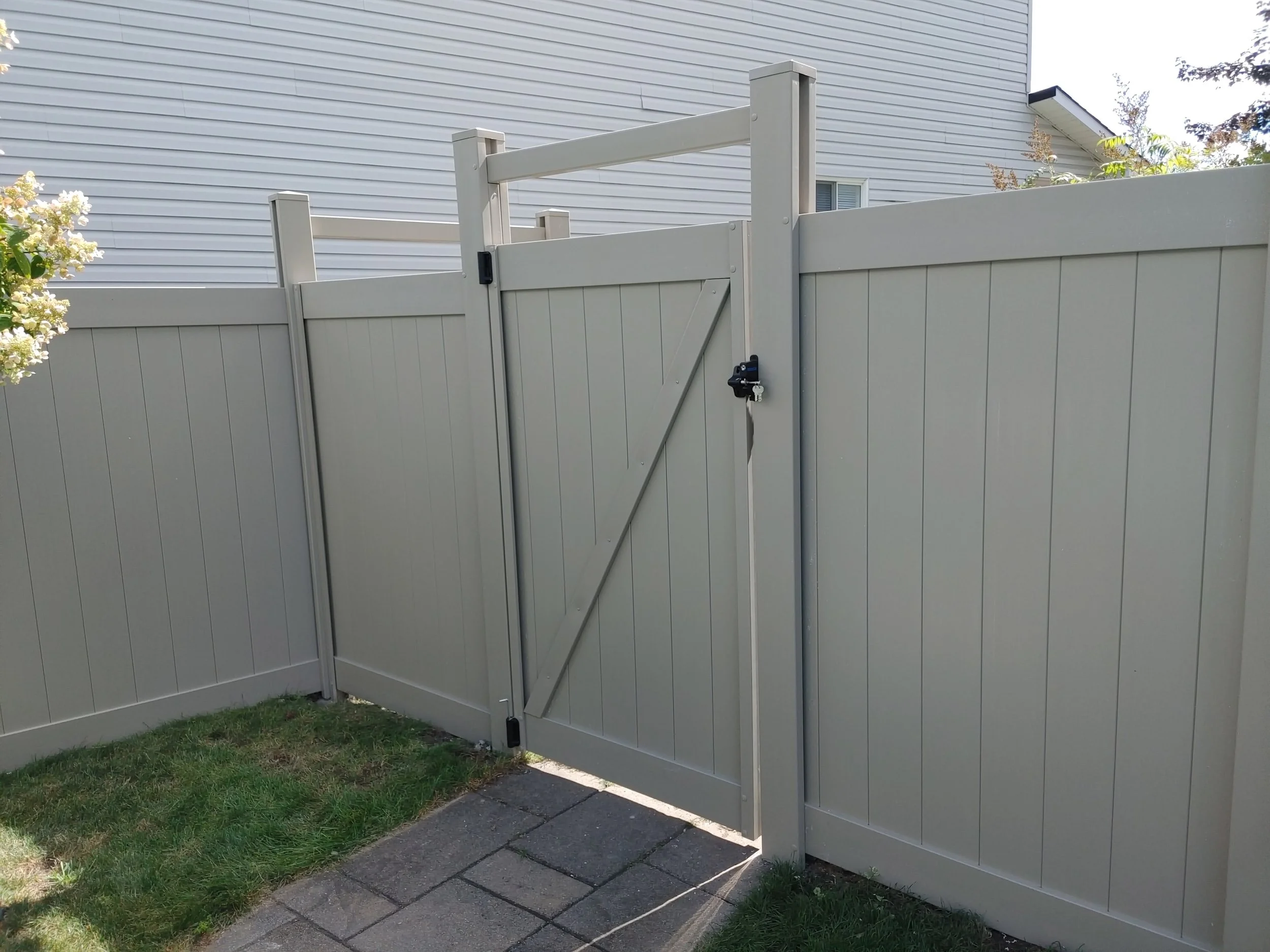 Adobe PVC Titan Fence in Stittsville, 2025. StandArt Fence
