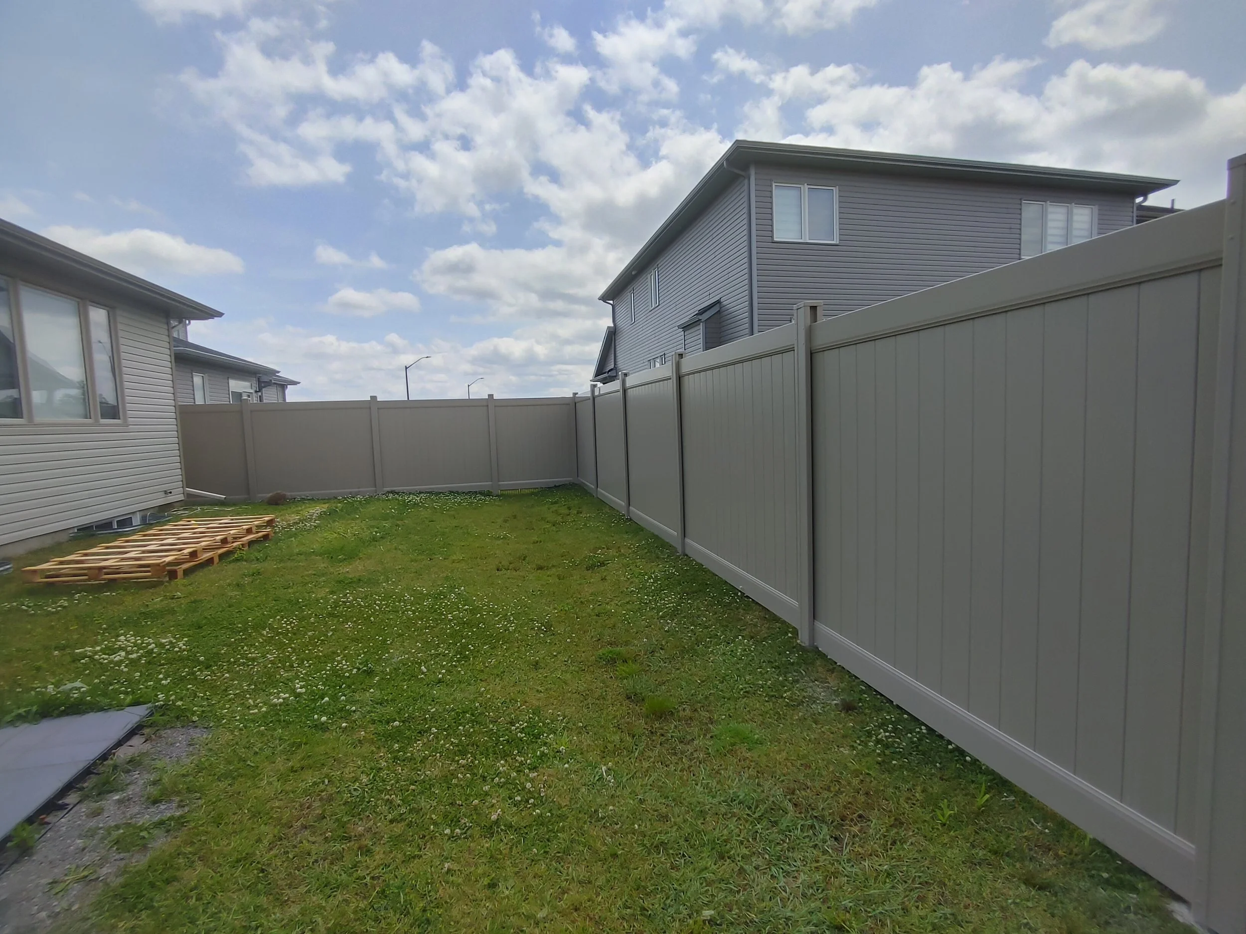 Adobe PVC Fence in Carleton Place, 2025. StandArt Fence 