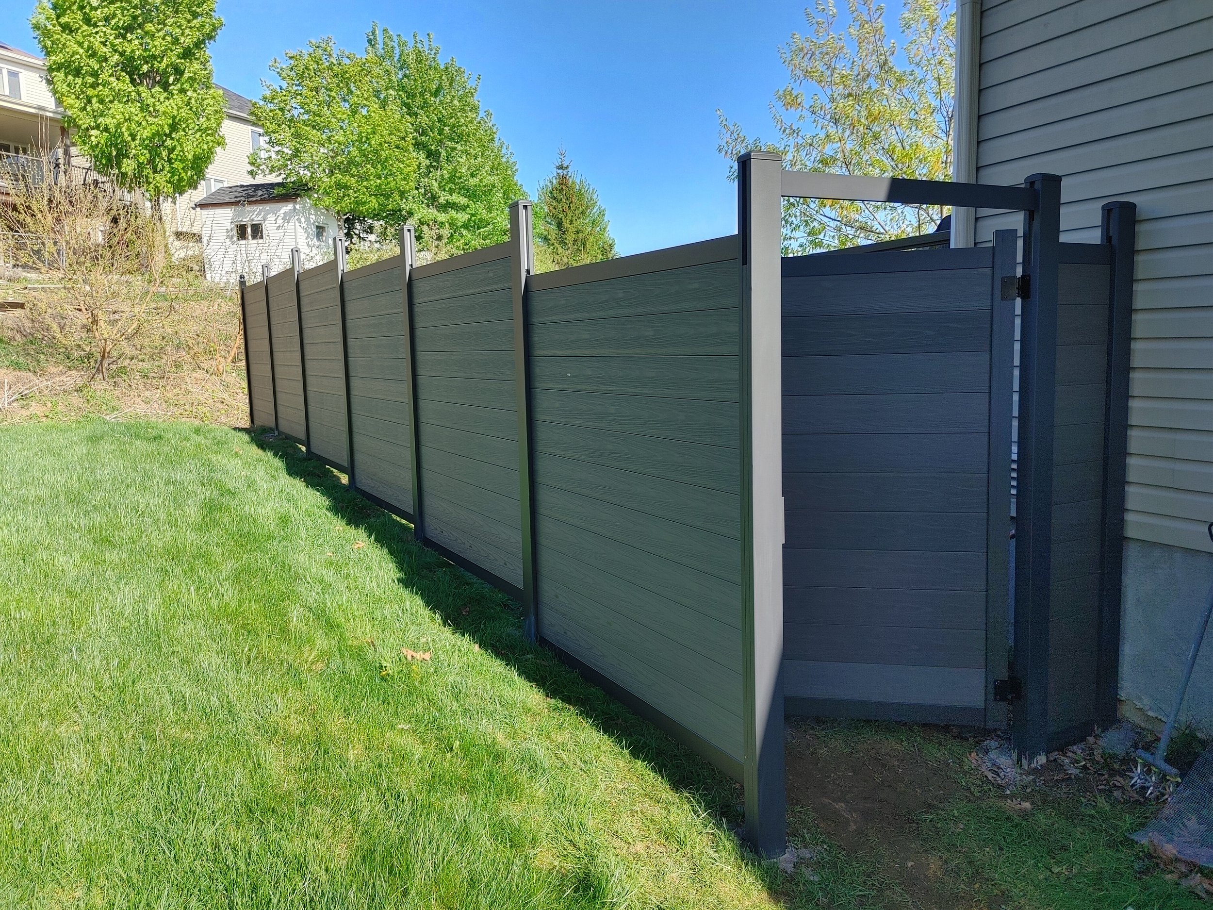 Dark Grey WPC and Iron Fence in Barrhaven, 2025. StandArt Fence 