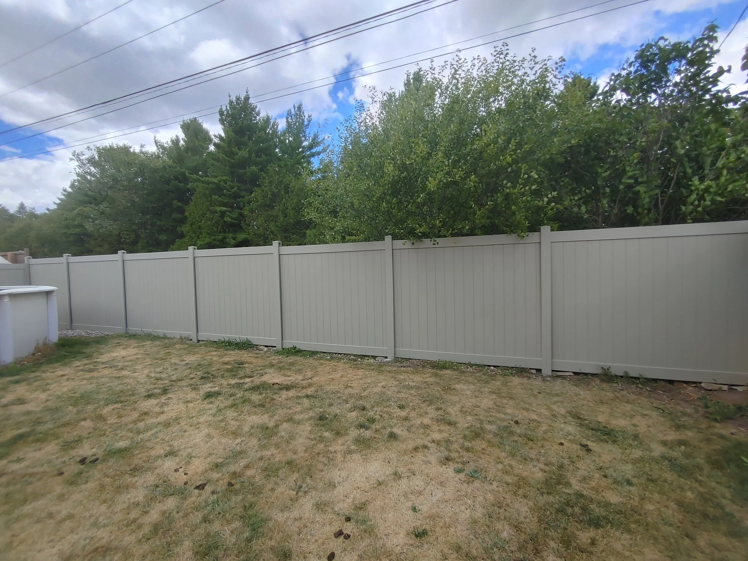 Adobe PVC Titan Fence in Stittsville, 2025. StandArt Fence