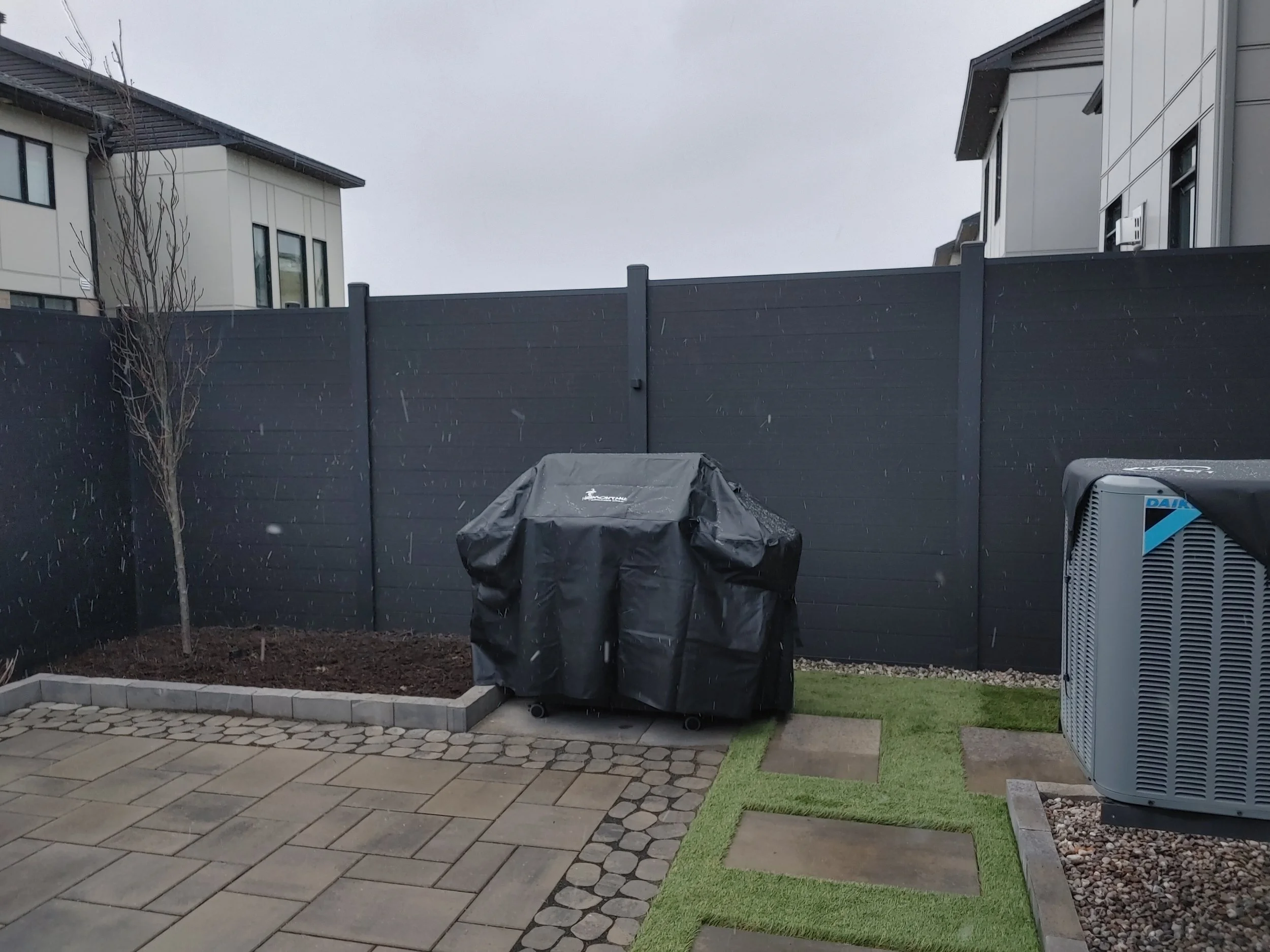 Black WPC Fence in Stittsville, 2025. StandArt Fence