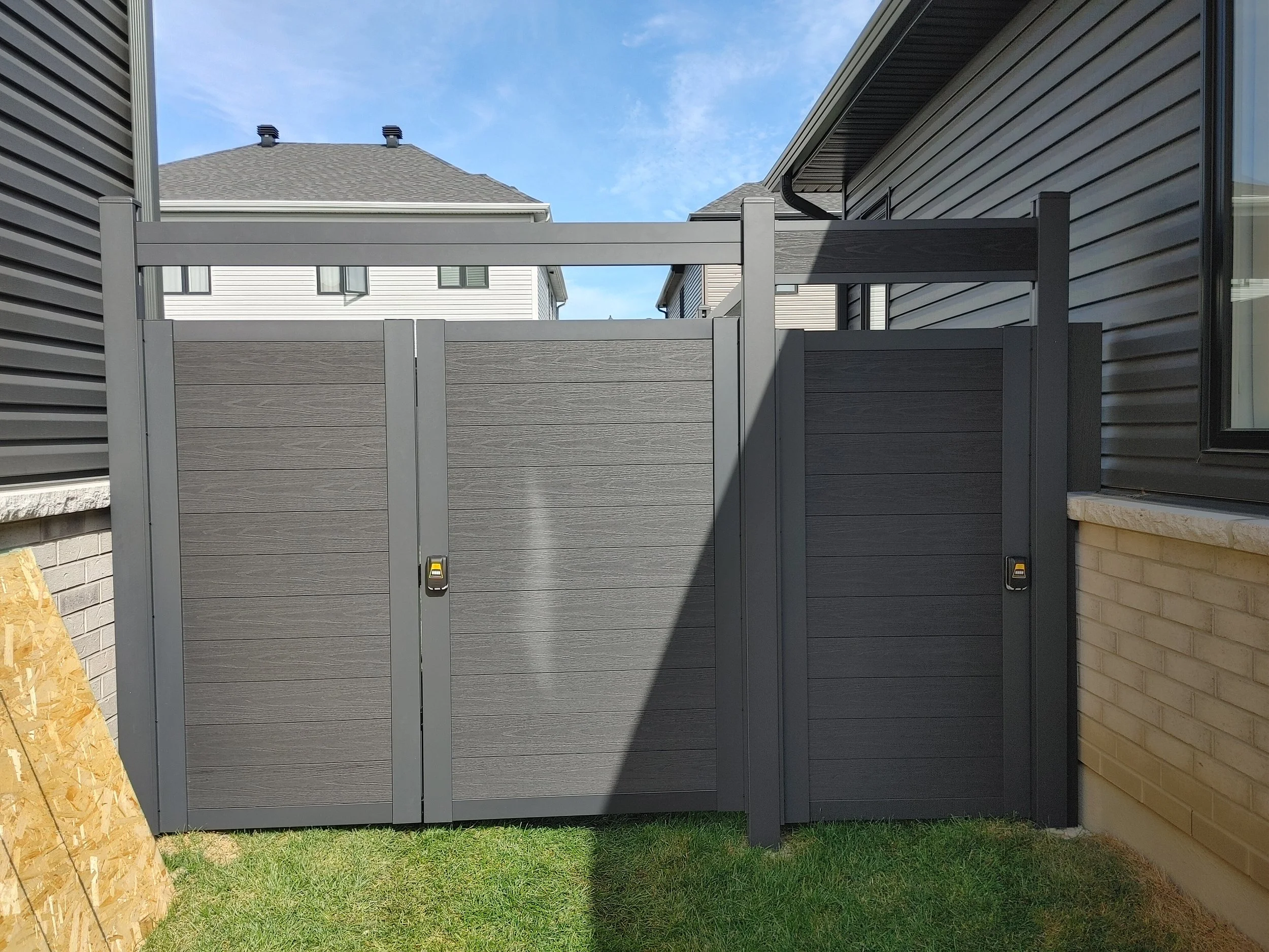 Black WPC Fence in Manotick, 2025. StandArt Fence