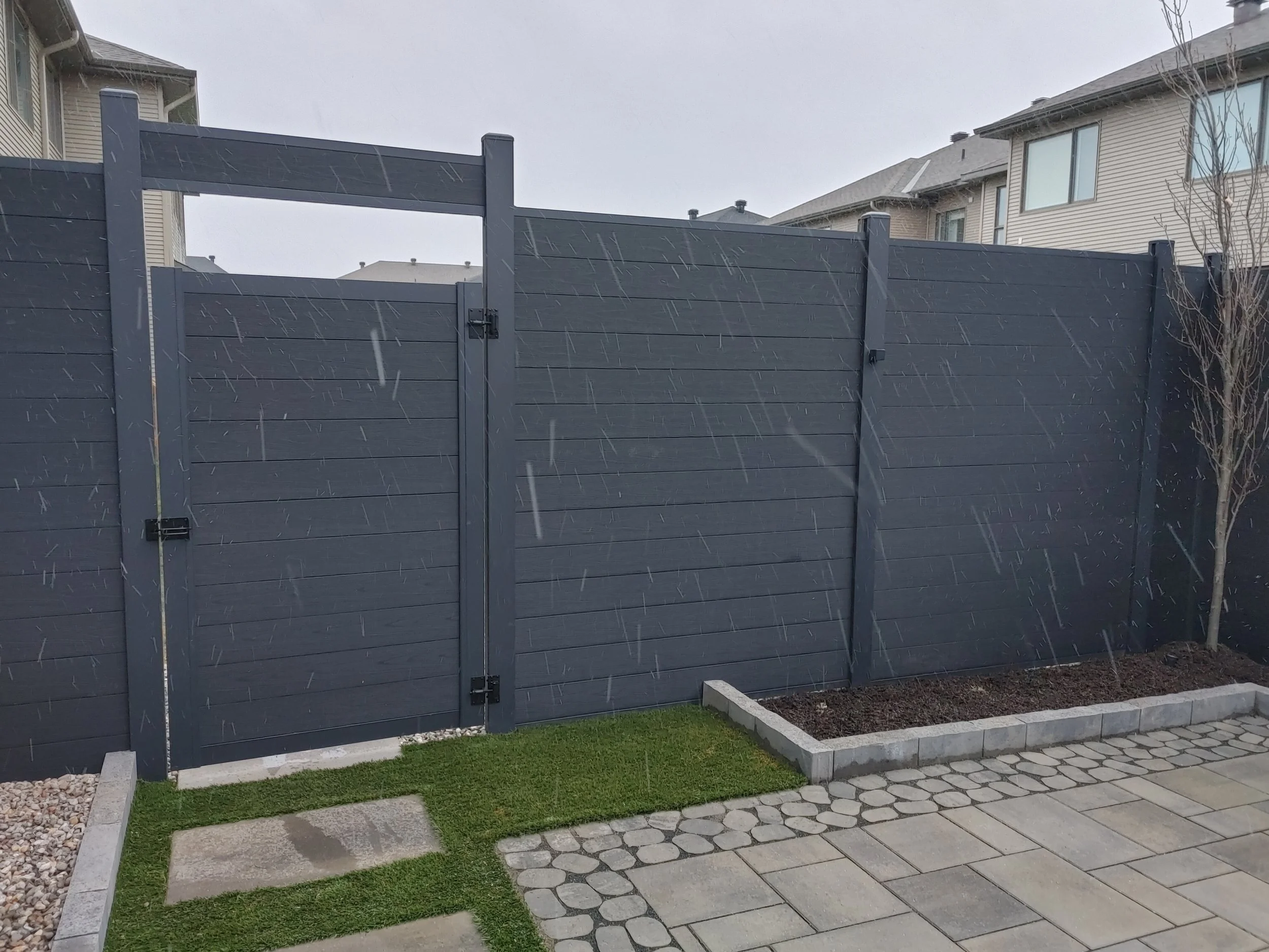 Black WPC Fence in Stittsville, 2025. StandArt Fence
