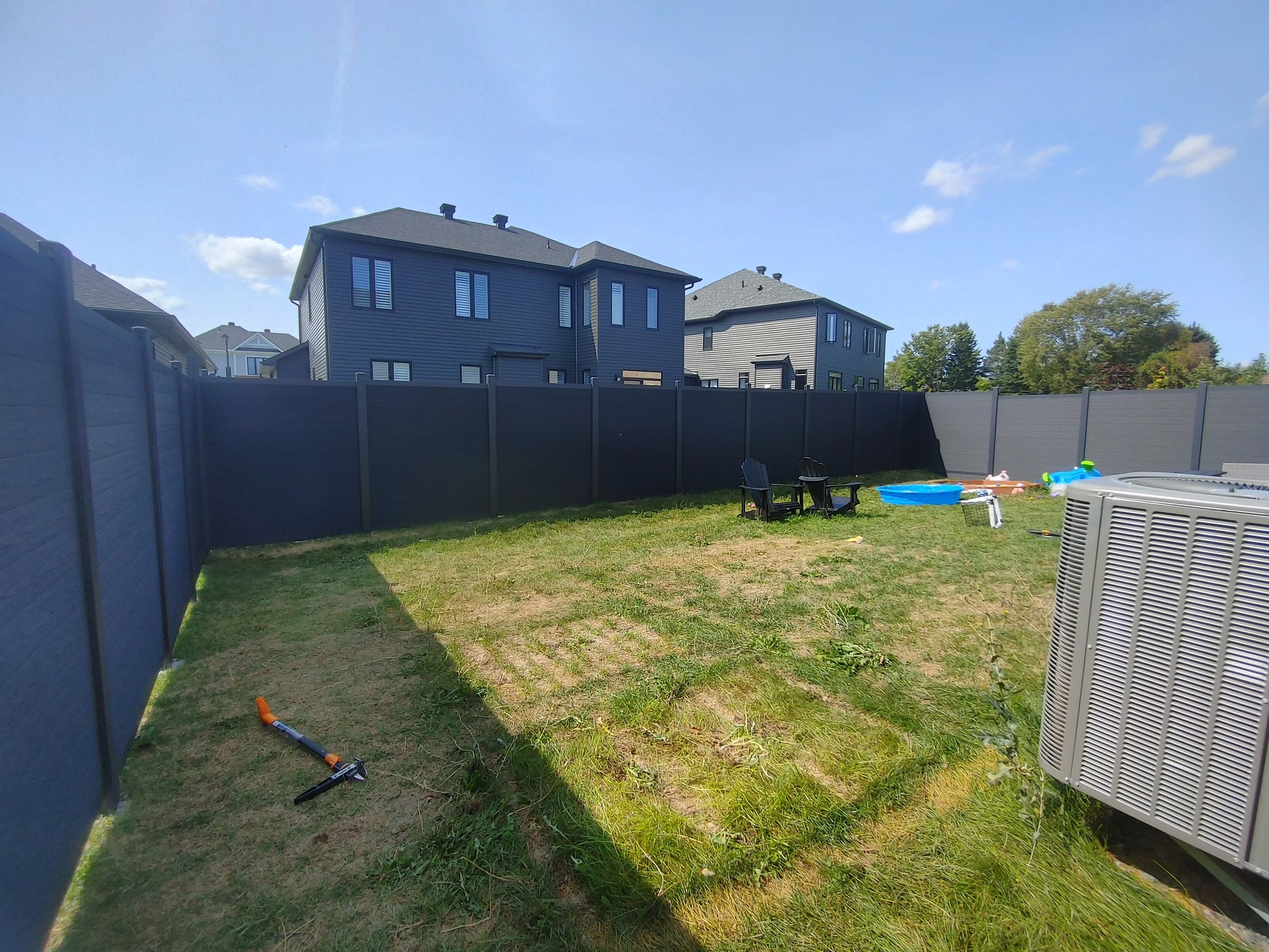 Black WPC Fence in Manotick, 2025. StandArt Fence