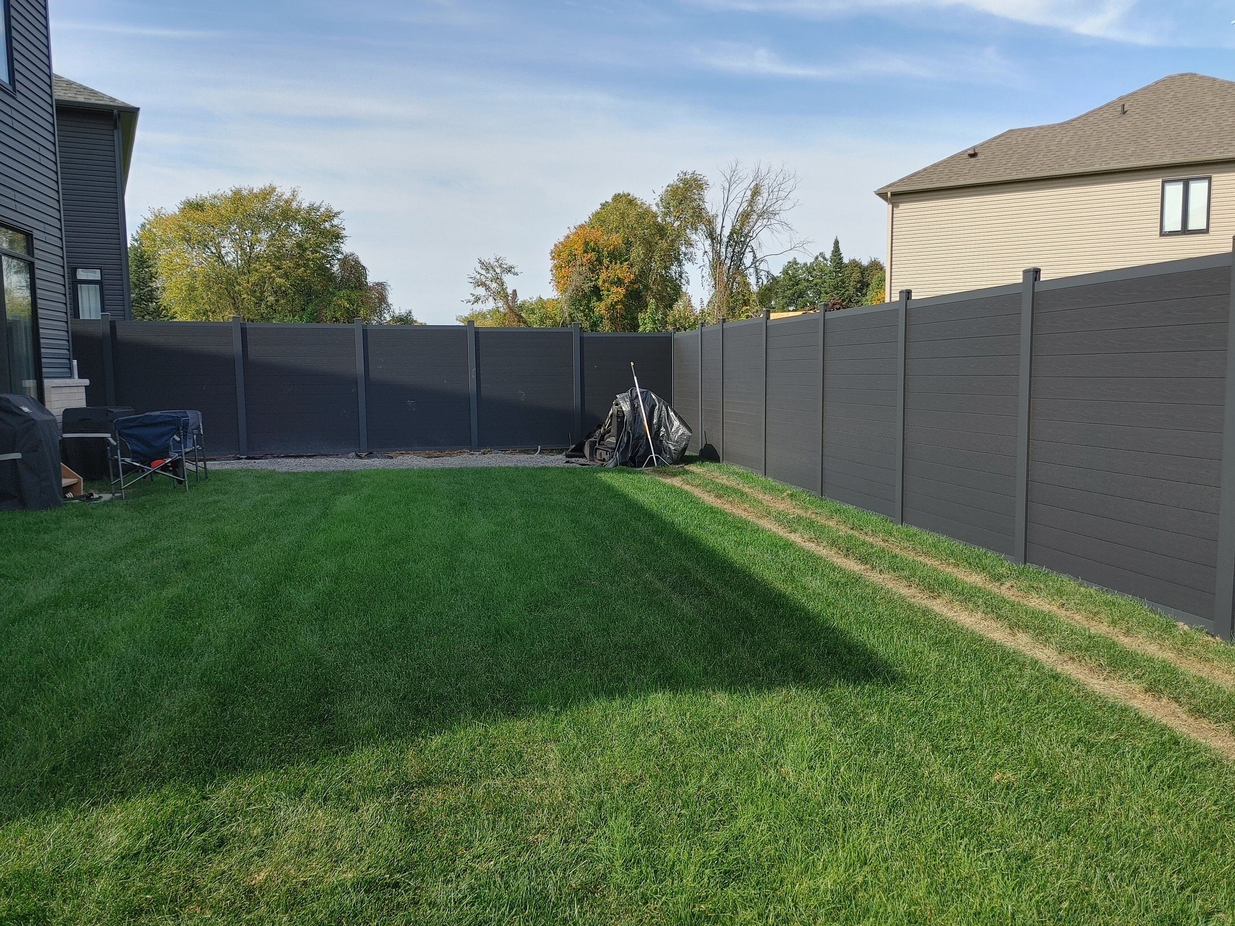 Black WPC Fence in Manotick, 2025. StandArt Fence