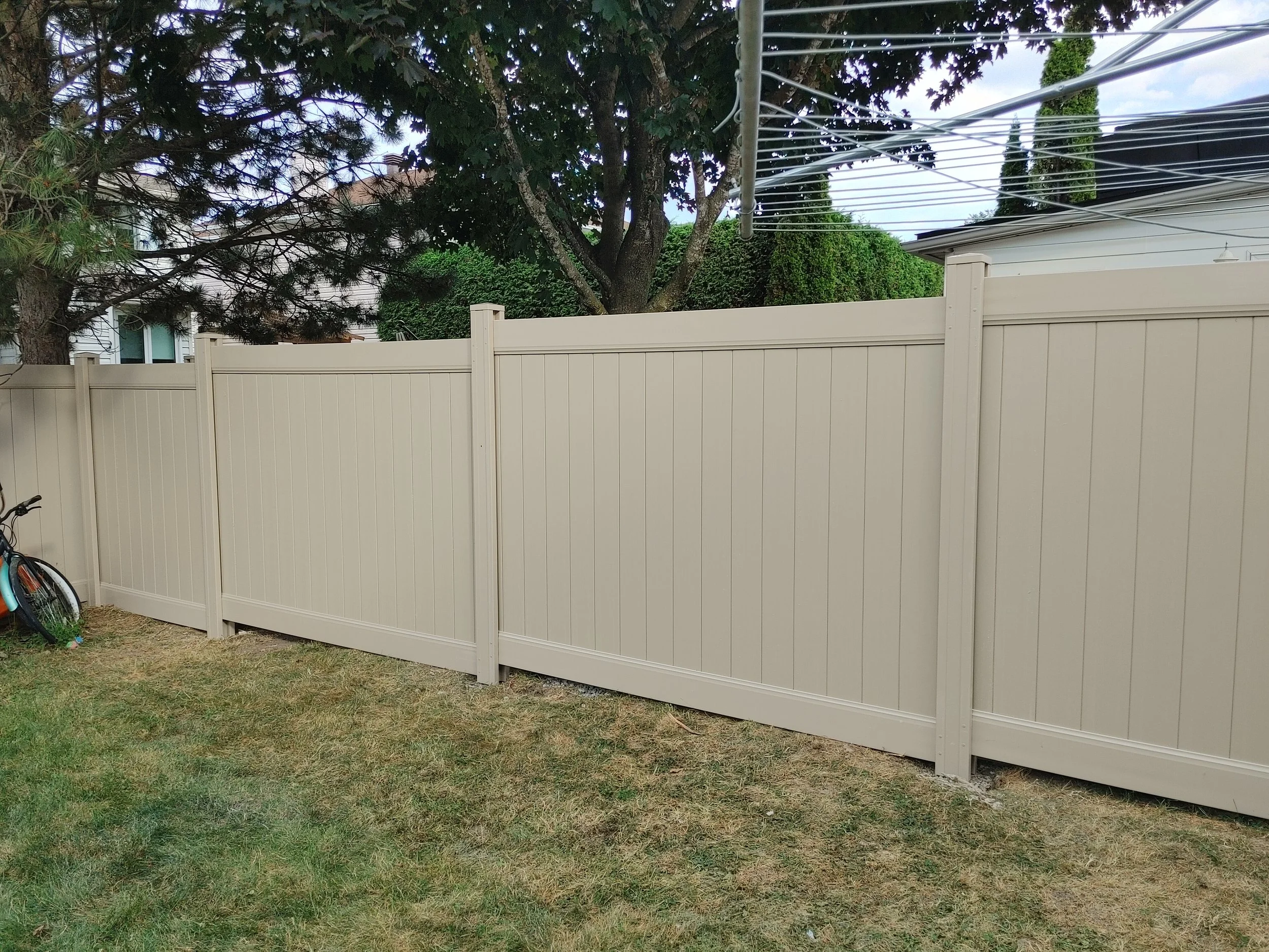 Adobe PVC Fence in Barrhaven, 2025. StandArt Fence 