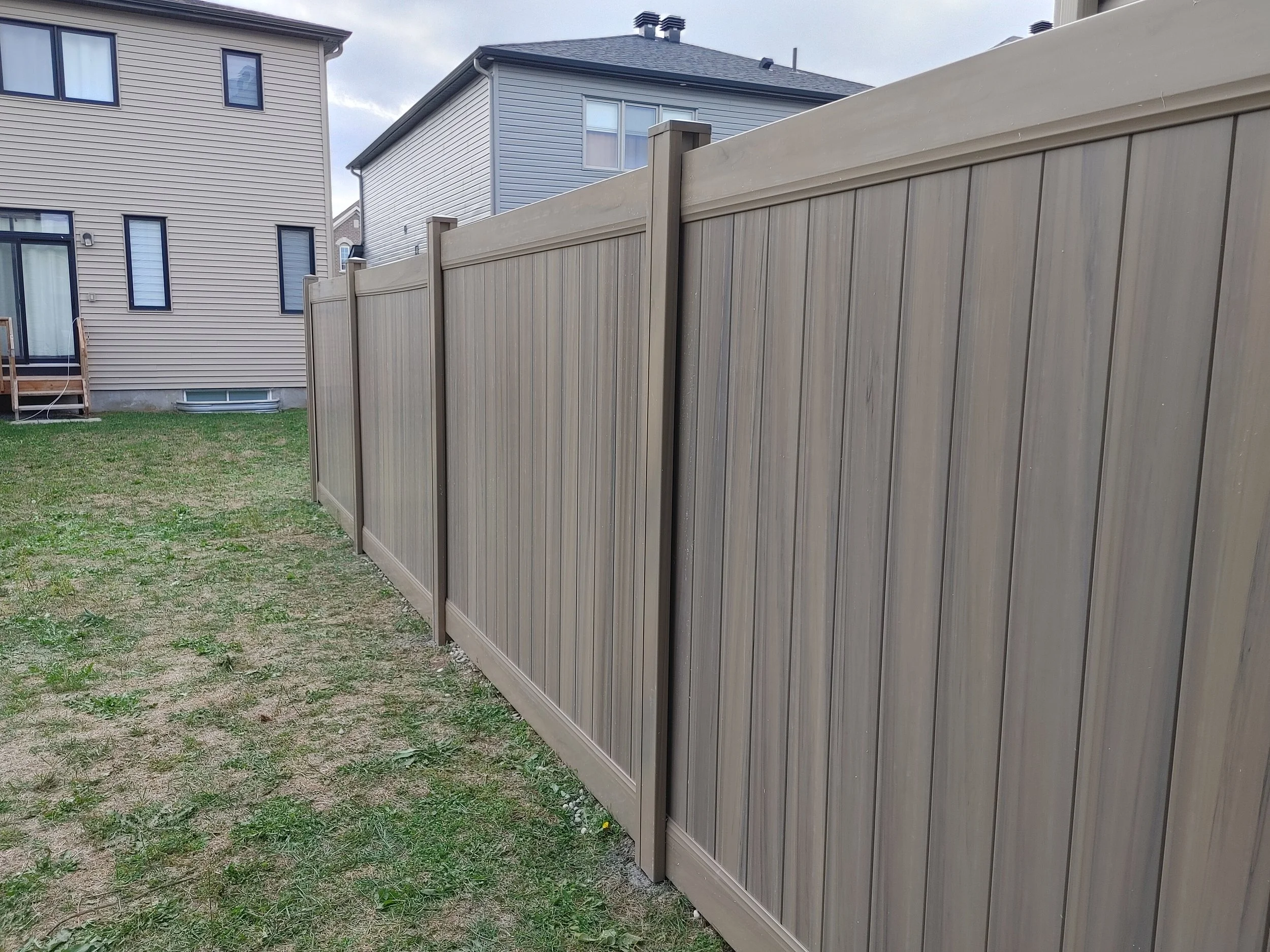 GreenTeak PVC Fence in Barrhaven, 2025. StandArt Fence