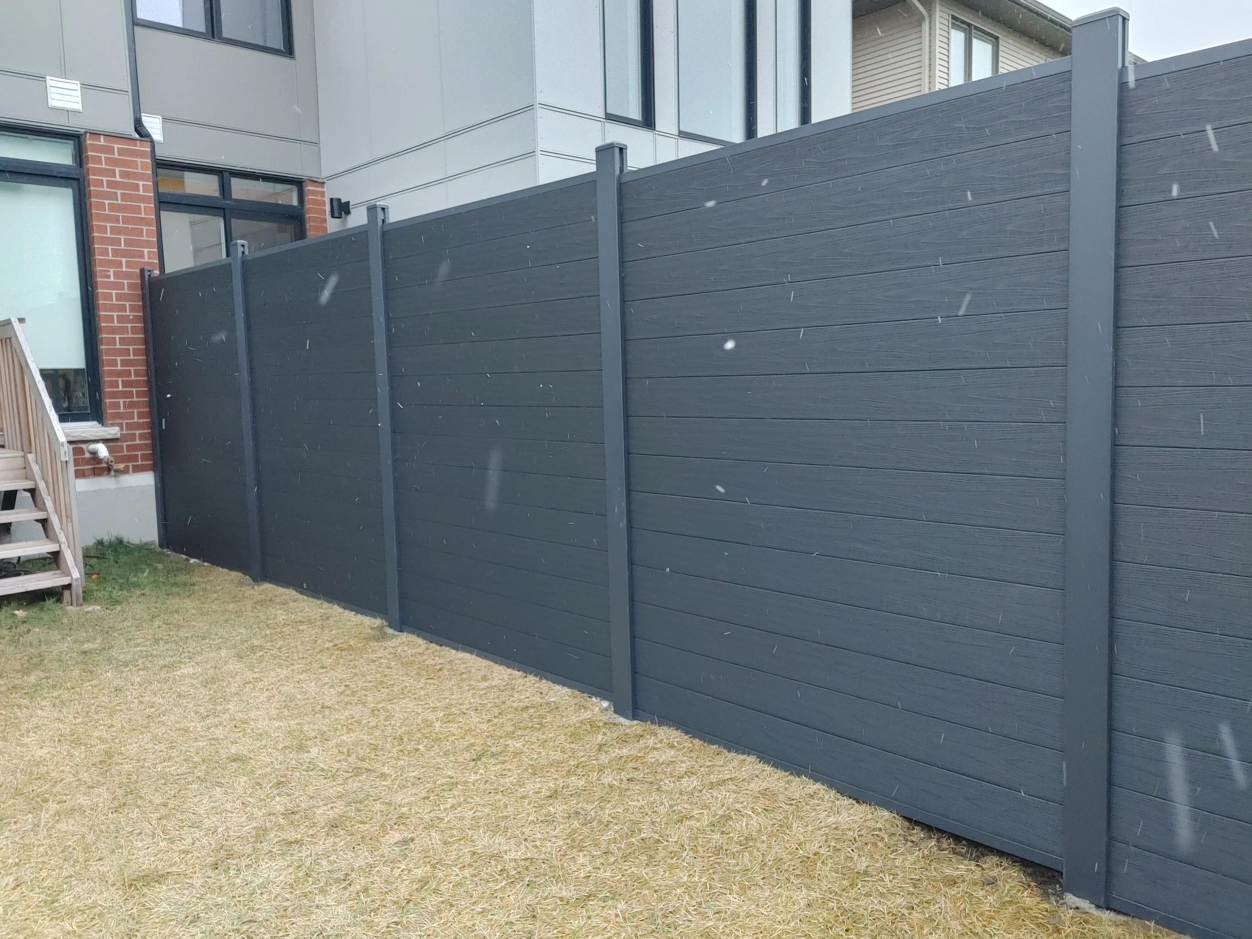 Black WPC Fence in Stittsville, 2025. StandArt Fence