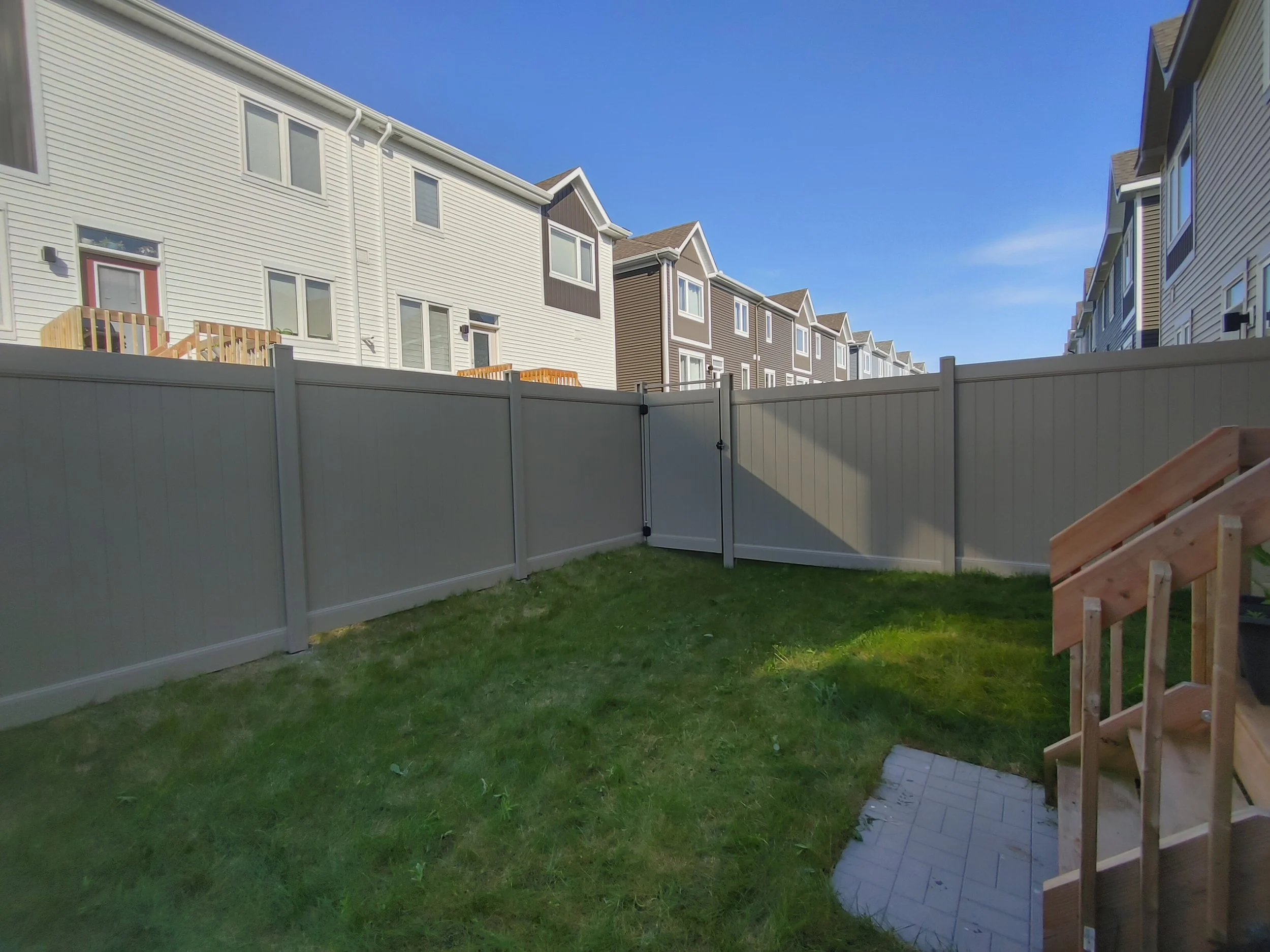 Adobe PVC Fence in Barrhaven, 2025. StandArt Fence 