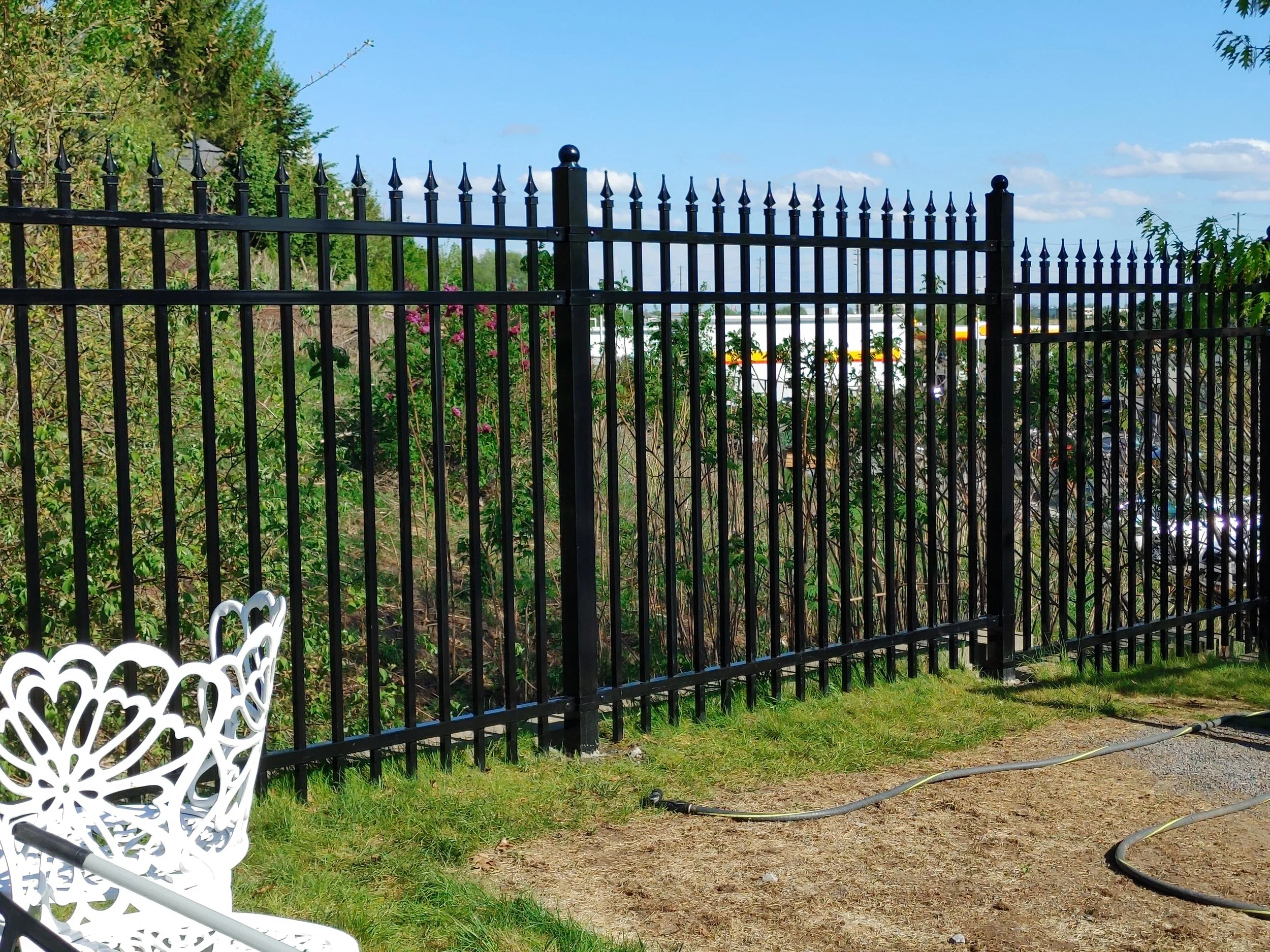 Dark Grey WPC and Iron Fence in Barrhaven, 2025. StandArt Fence 