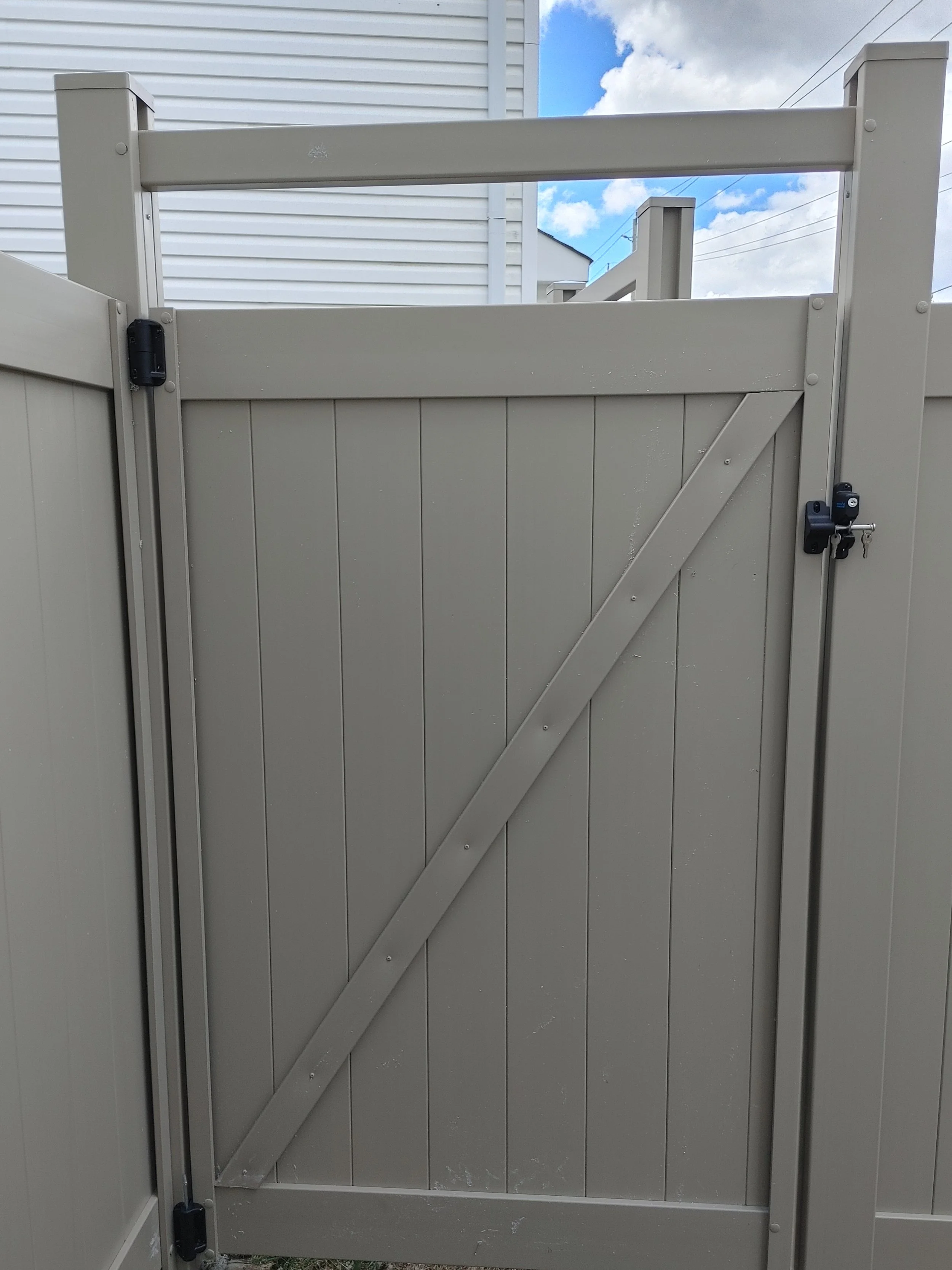 Adobe PVC Titan Fence in Stittsville, 2025. StandArt Fence