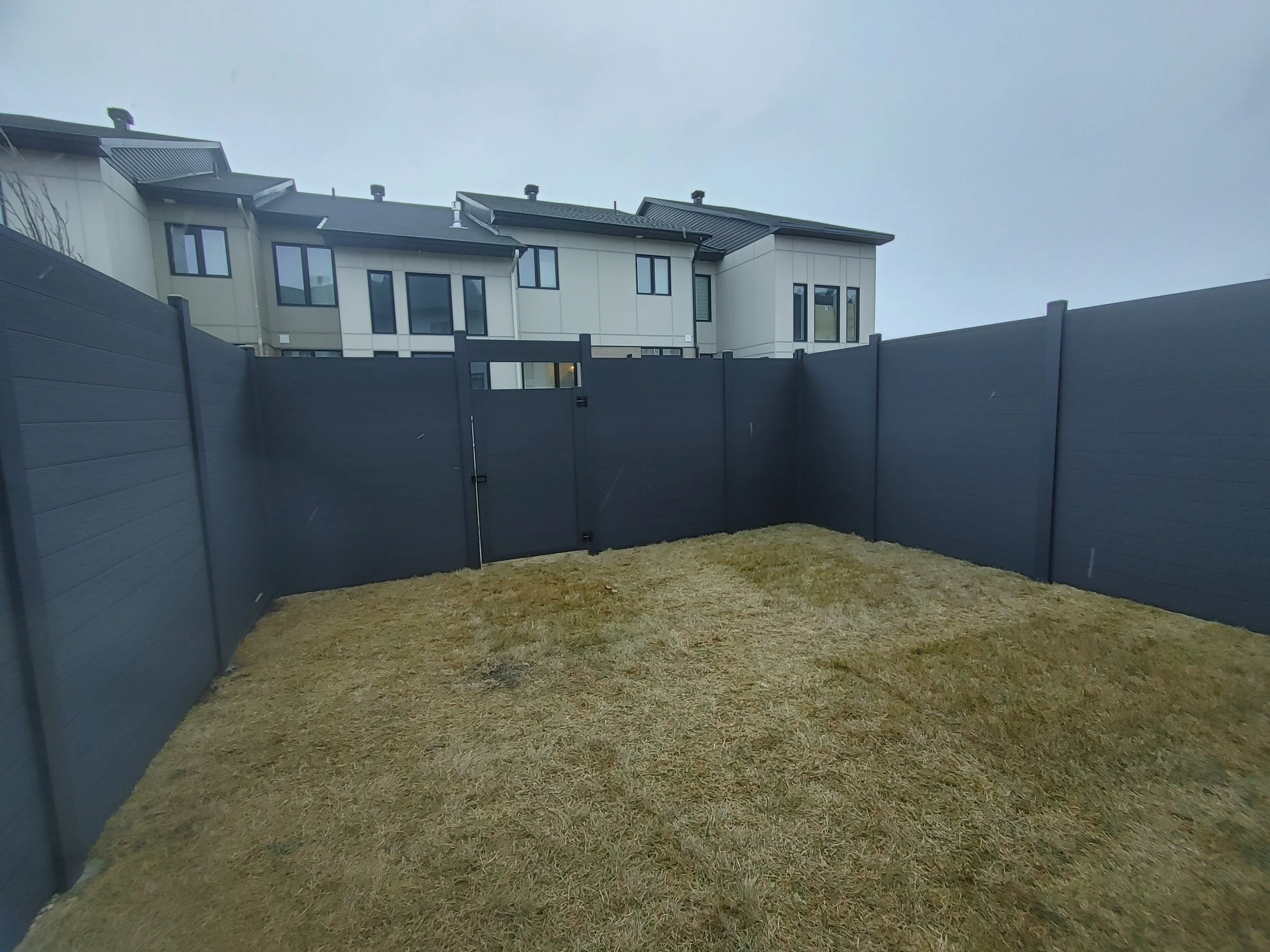 Black WPC Fence in Stittsville, 2025. StandArt Fence