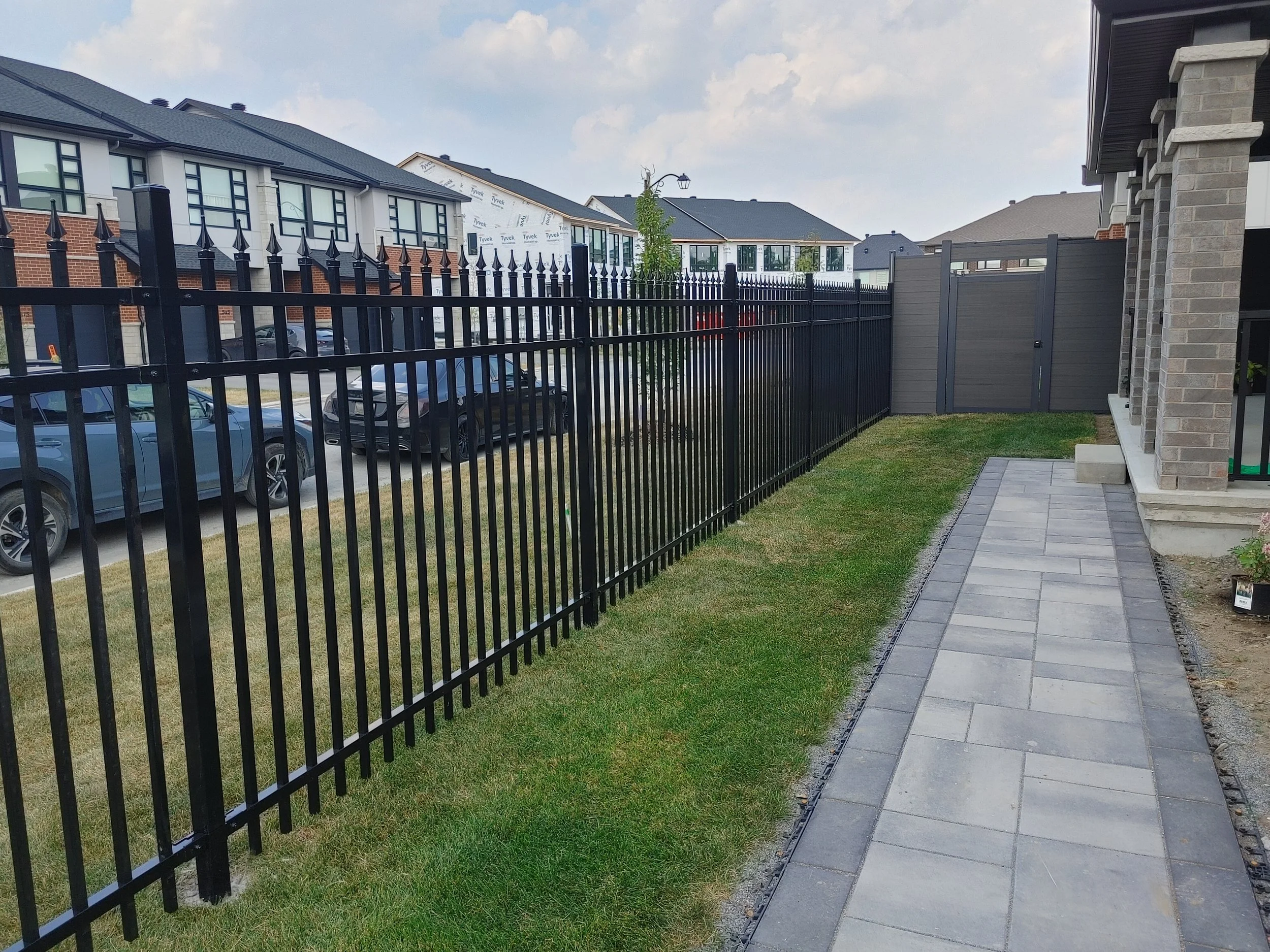 Dark Grey WPC/Iron Fence in Stittsville, 2025. StandArt Fence 
