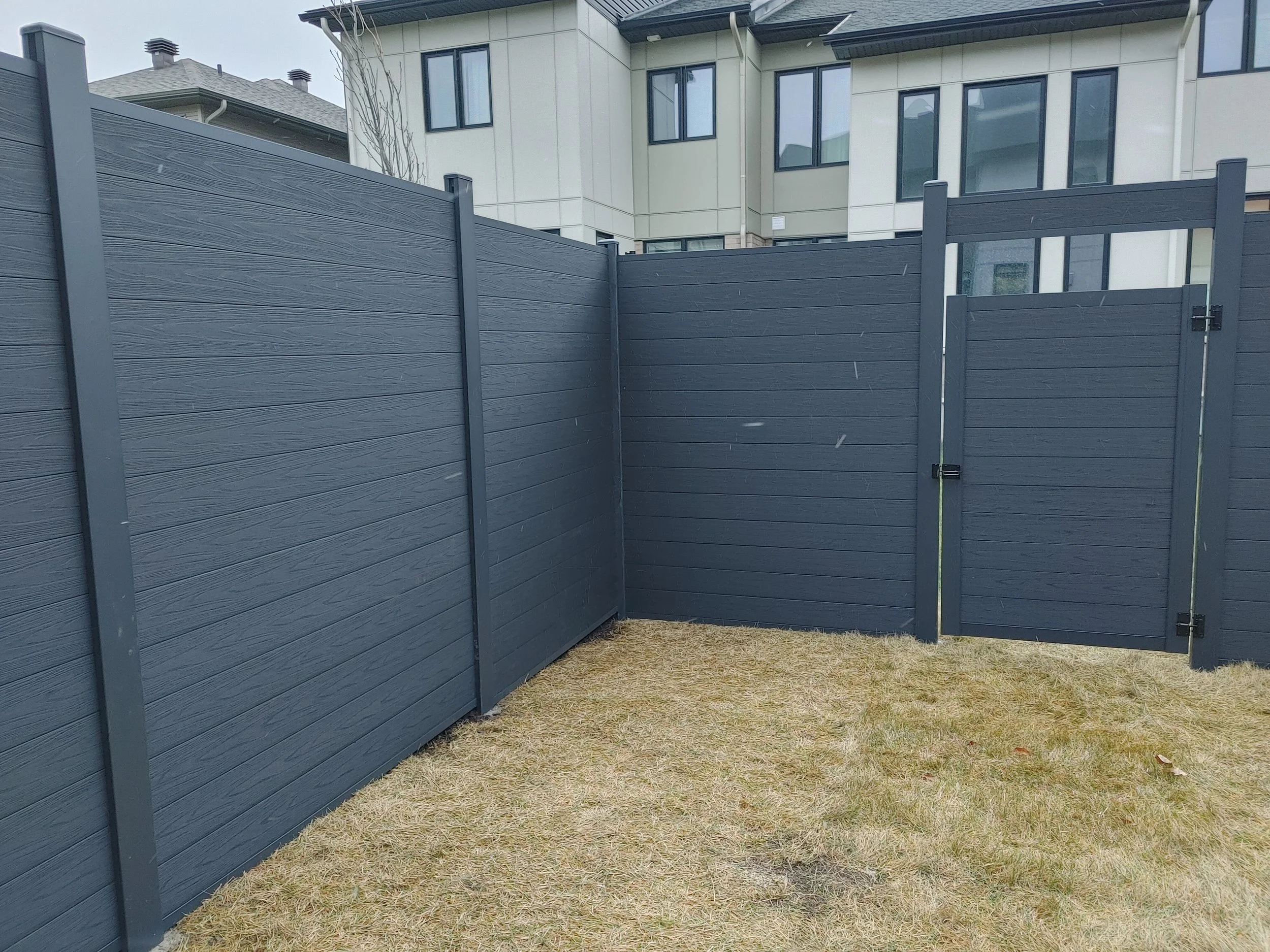 Black WPC Fence in Stittsville, 2025. StandArt Fence