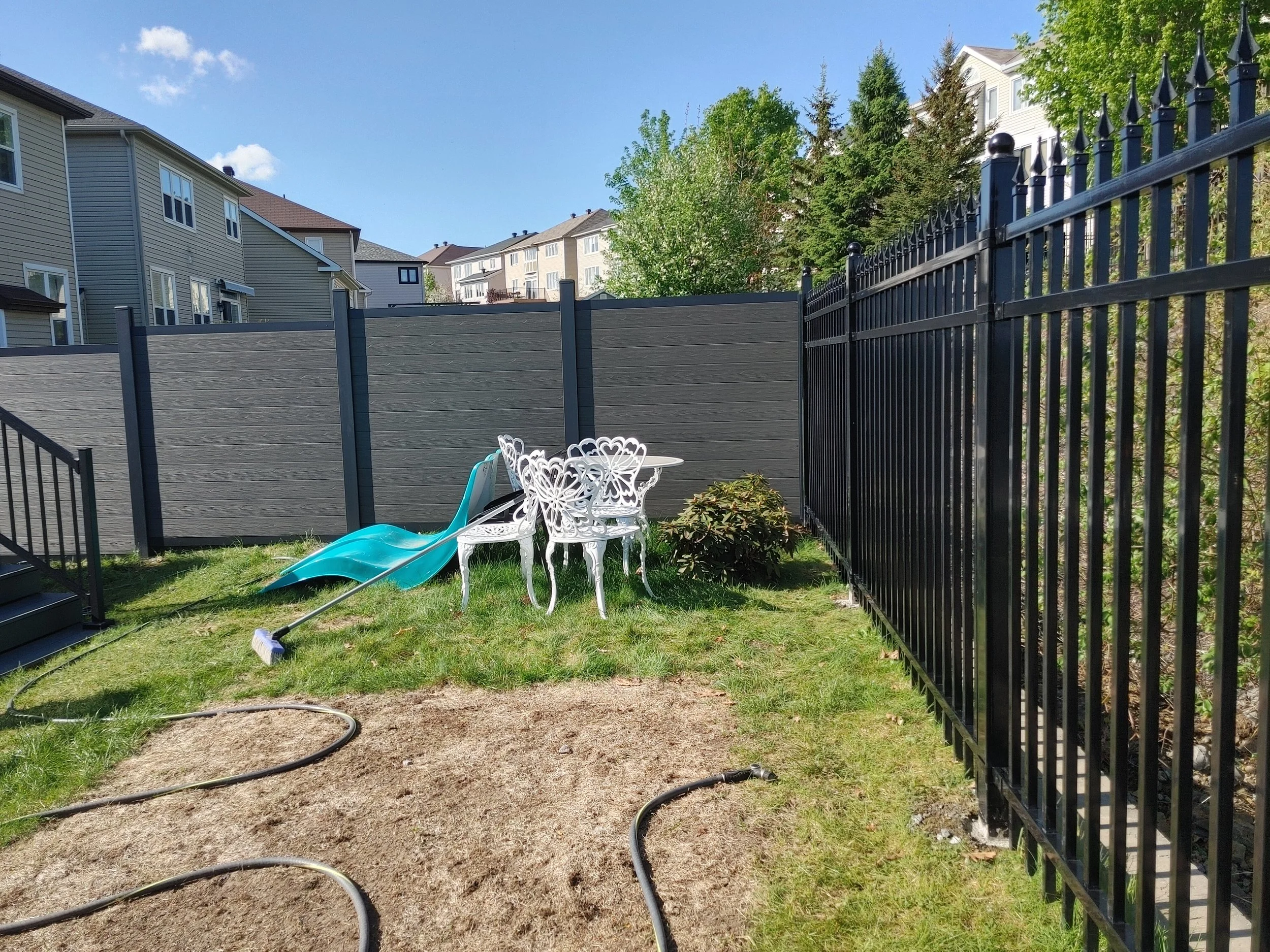 Dark Grey WPC and Iron Fence in Barrhaven, 2025. StandArt Fence 