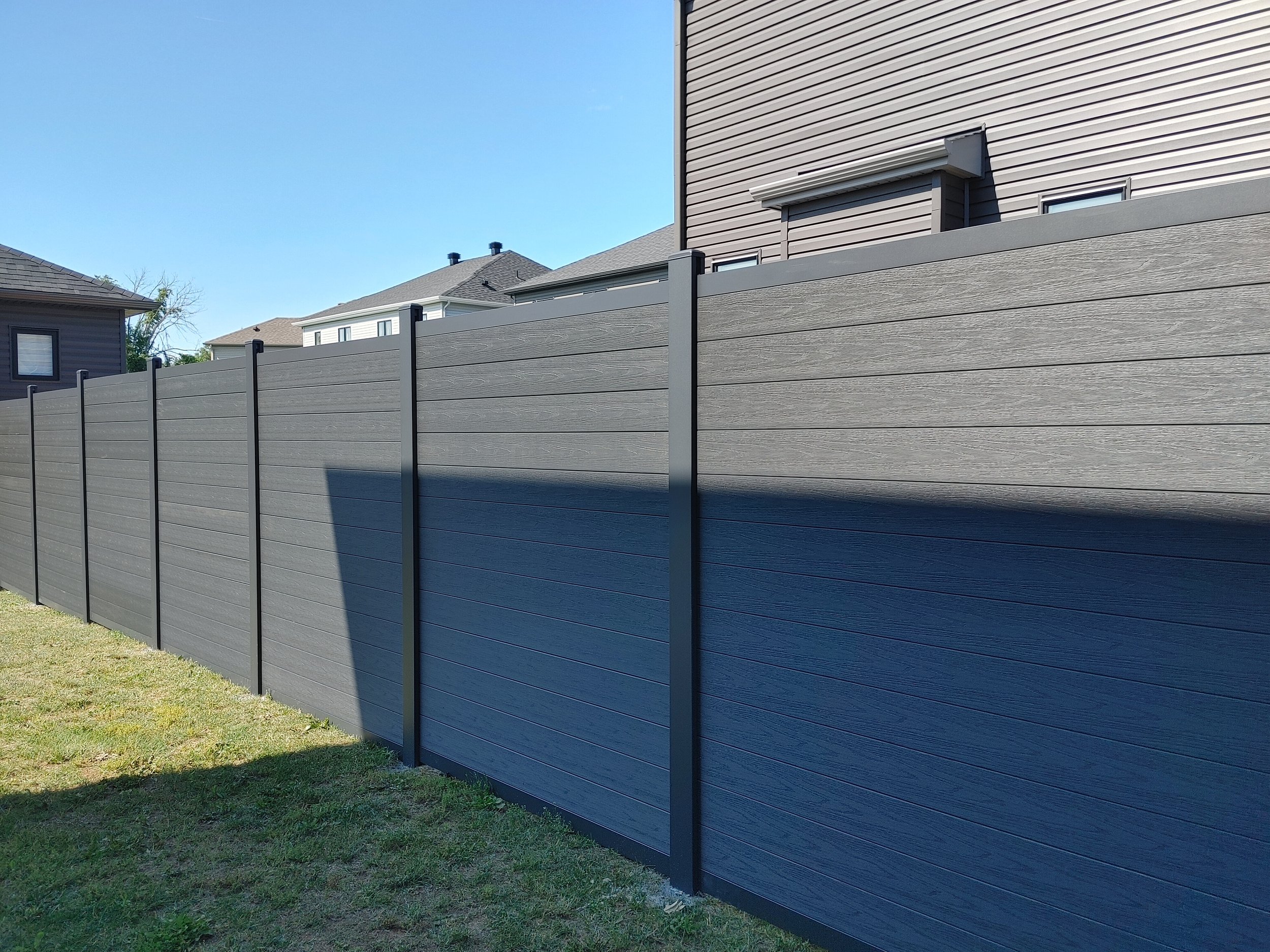Black WPC Fence in Manotick, 2025. StandArt Fence 
