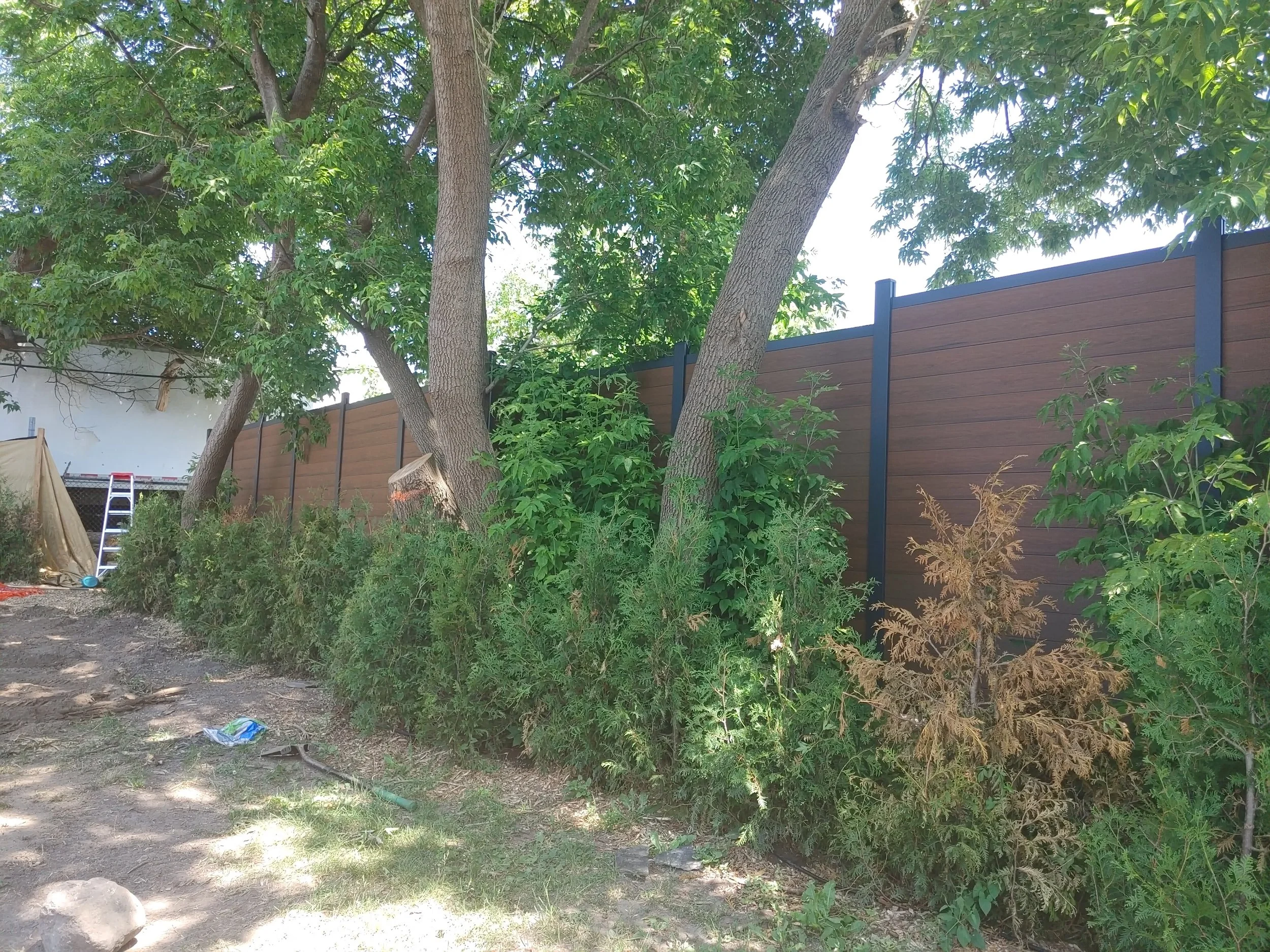 Brown WPC Fence in Vanier, 2025. StandArt Fence 