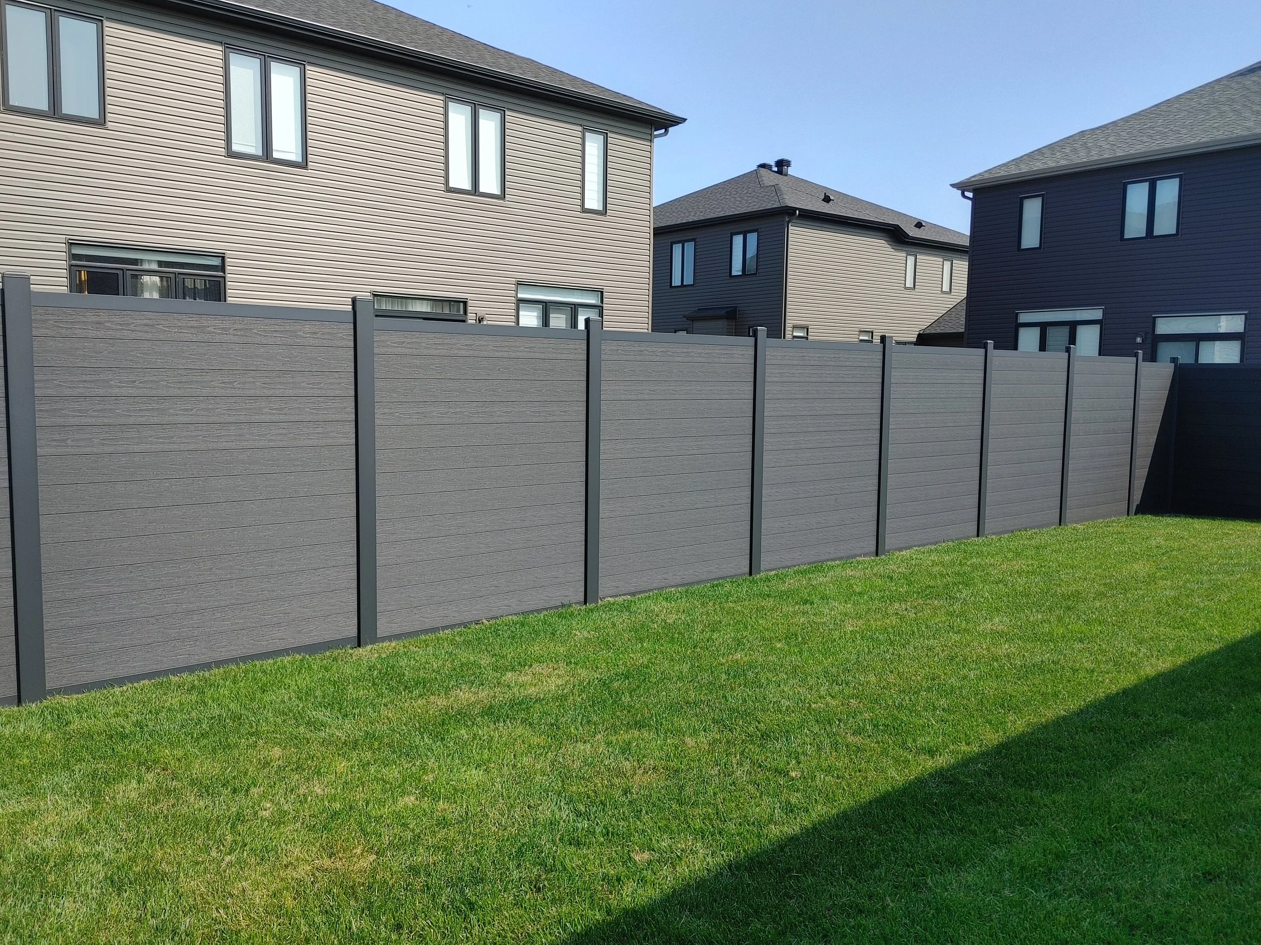 Black WPC Fence in Manotick, 2025. StandArt Fence