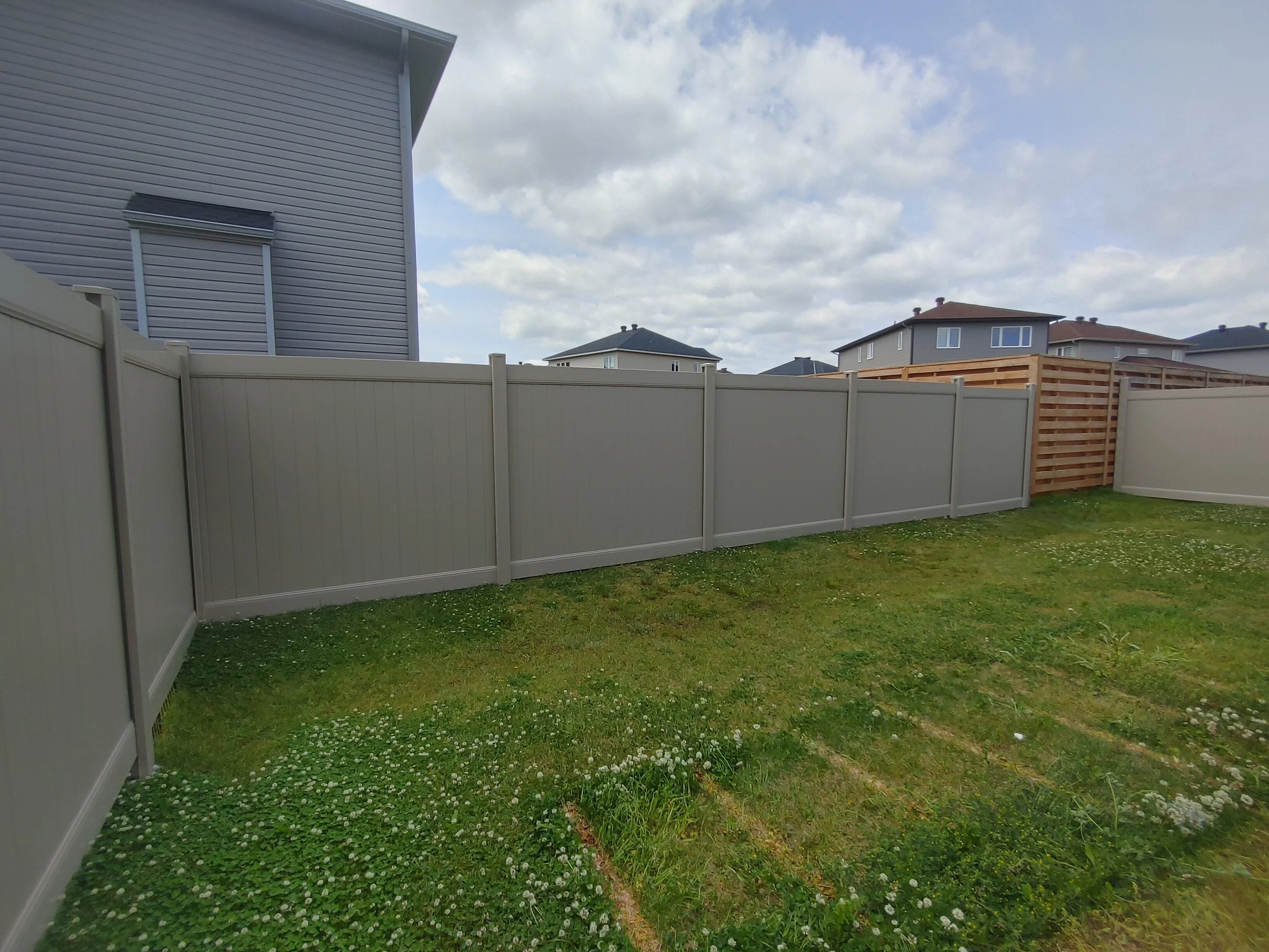Adobe PVC Fence in Carleton Place, 2025. StandArt Fence 