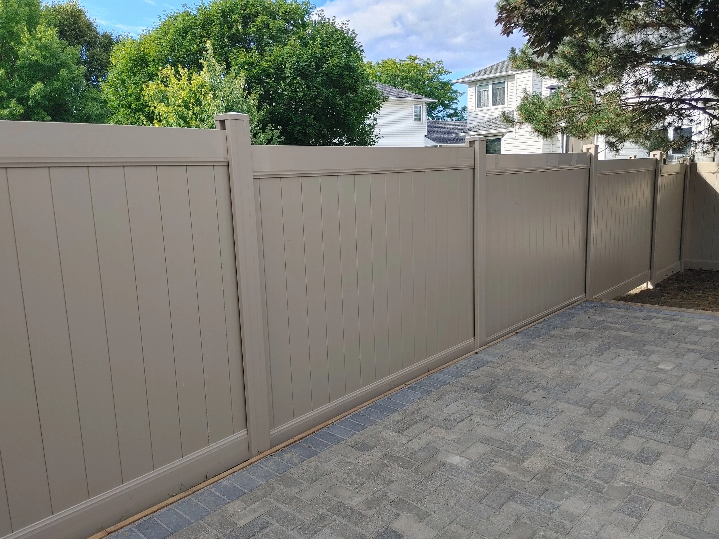 Adobe PVC Fence in Barrhaven, 2025. StandArt Fence 
