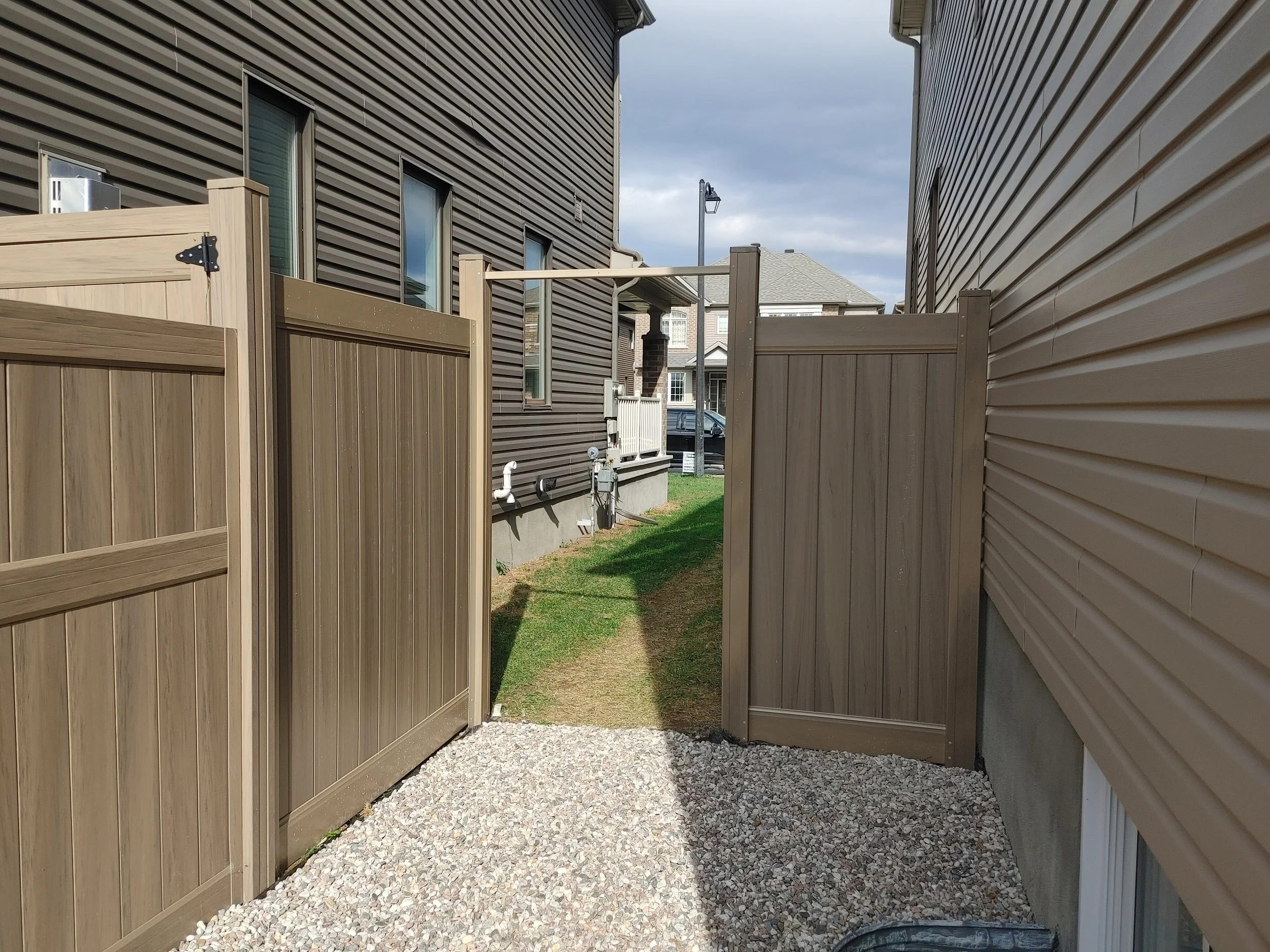 GreenTeak PVC Fence in Barrhaven, 2025. StandArt Fence