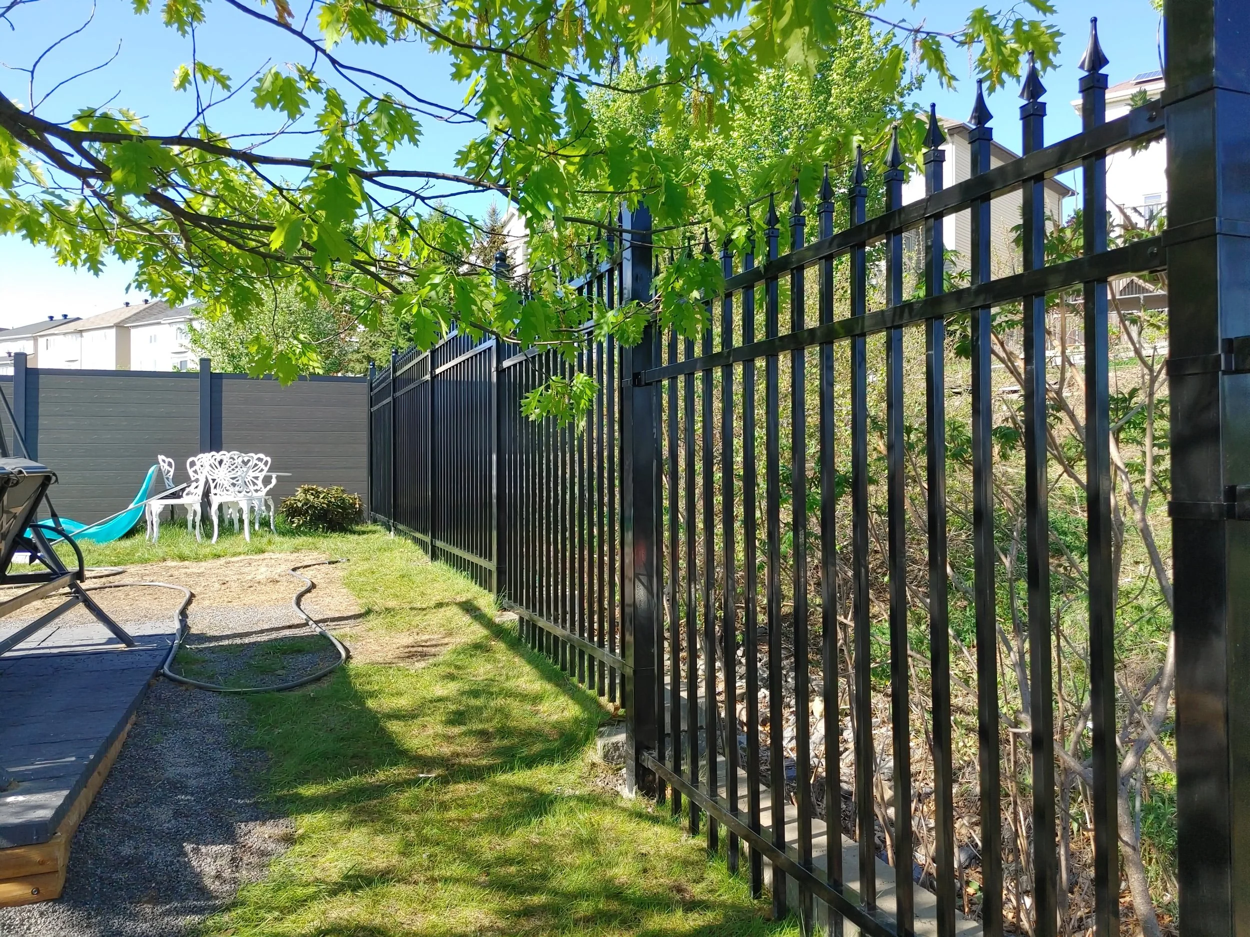 Dark Grey WPC and Iron Fence in Barrhaven, 2025. StandArt Fence 