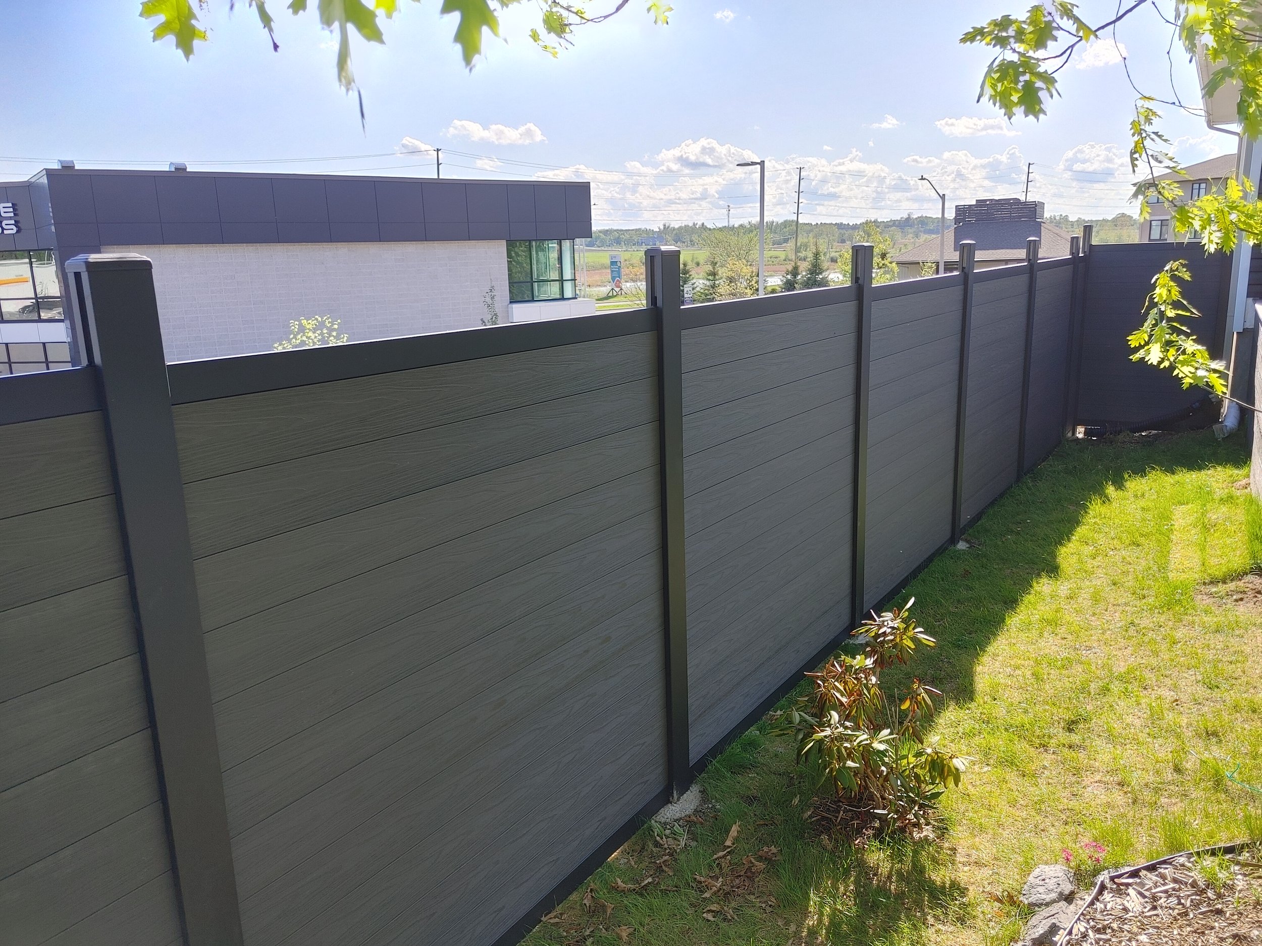 Dark Grey WPC and Iron Fence in Barrhaven, 2025. StandArt Fence 
