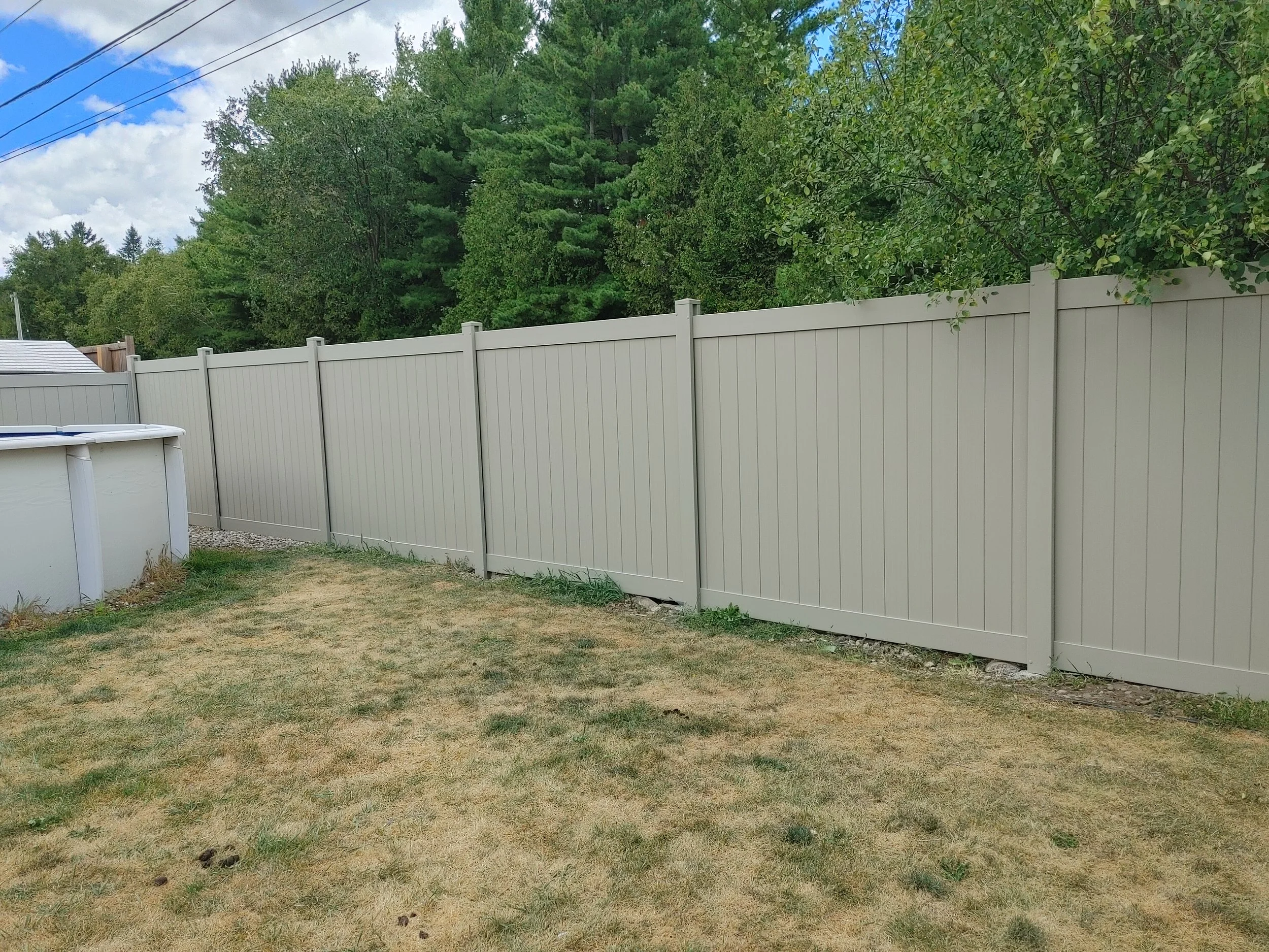 Adobe PVC Titan Fence in Stittsville, 2025. StandArt Fence