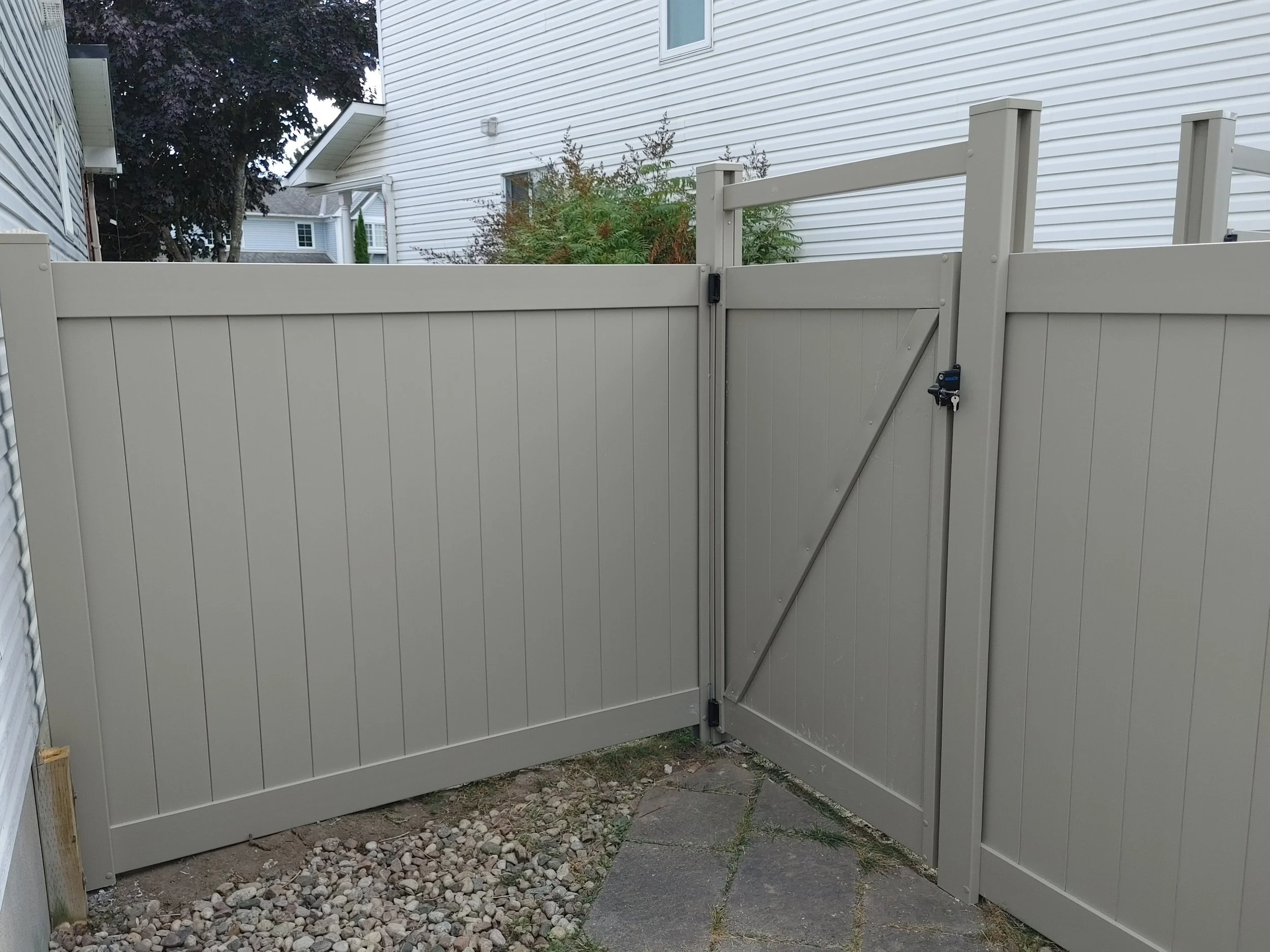 Adobe PVC Titan Fence in Stittsville, 2025. StandArt Fence
