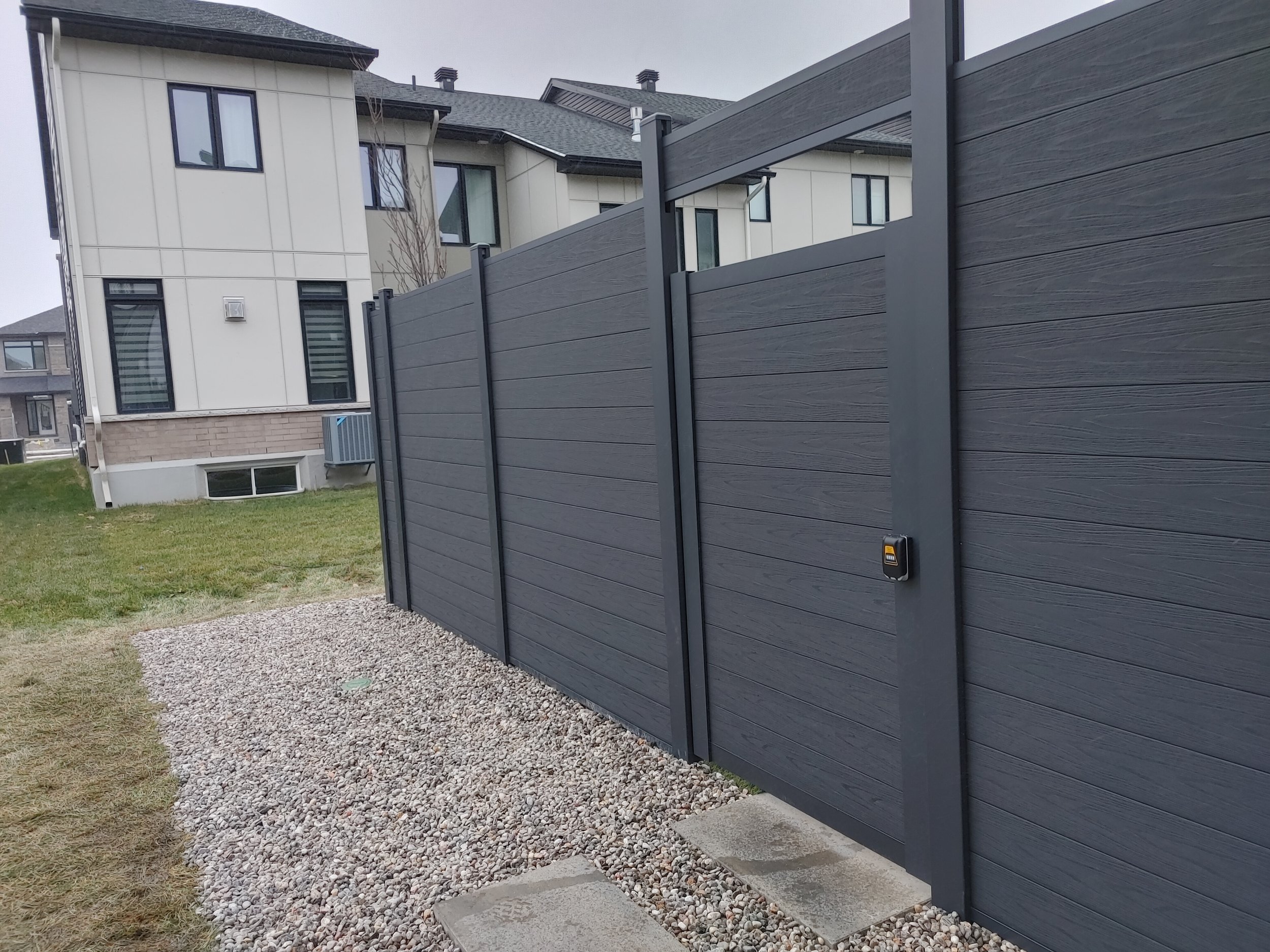 Black WPC Fence in Stittsville, 2025. StandArt Fence