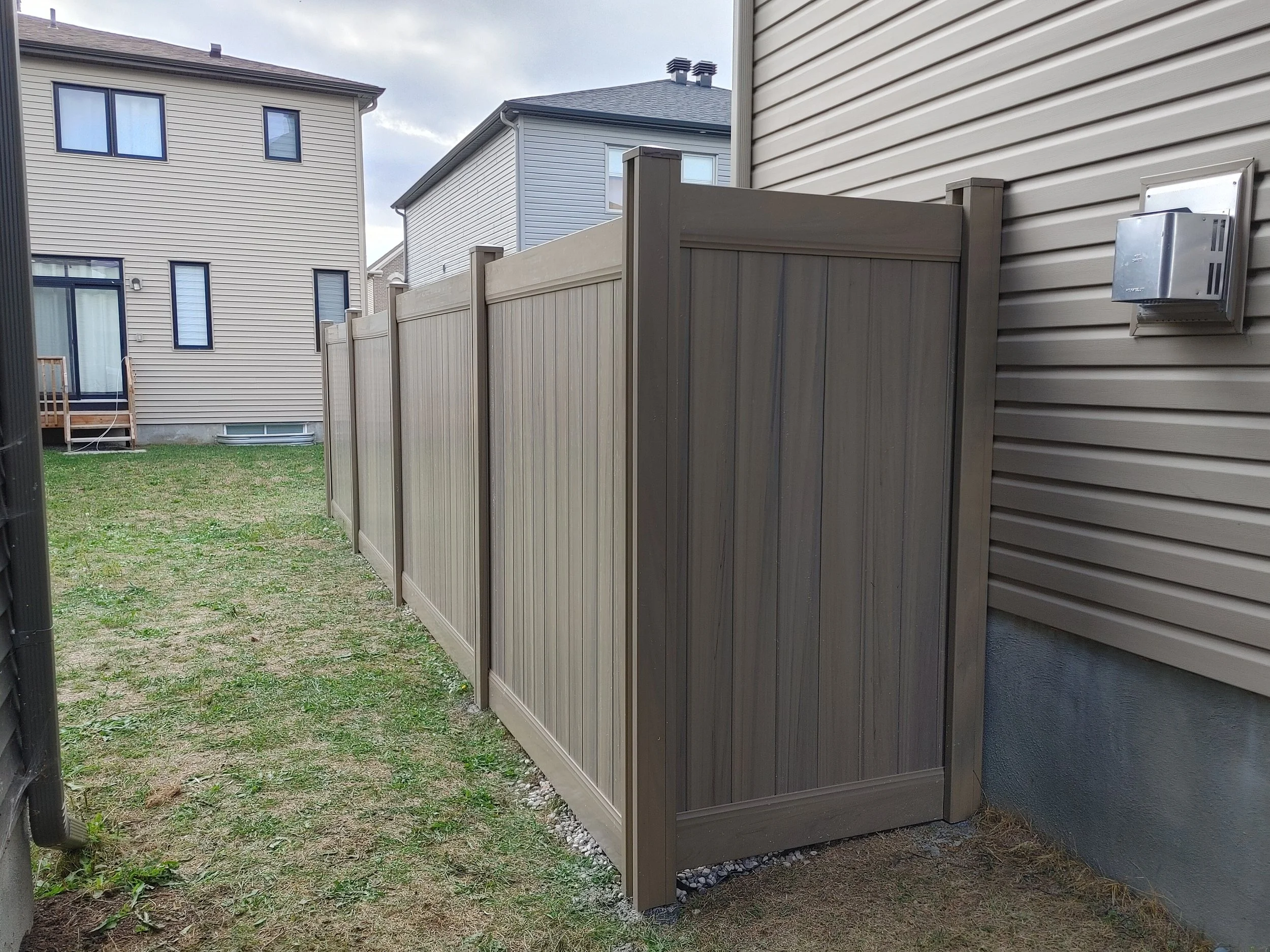 GreenTeak PVC Fence in Barrhaven, 2025. StandArt Fence